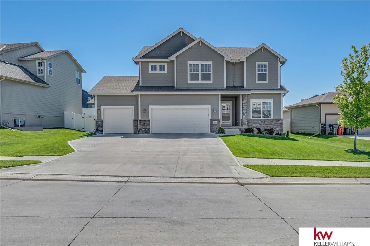 *OPEN HOUSE SAT., 5/11 @ 12:00 - 2:00PM* You will NOT want to miss this move-in ready, 5-year-old home that is NOW AVAILABLE! Located in sought after Elkhorn subdivision, Westbury Creek, you will feel immediately at "home" from the moment you enter. Natural light is abundant throughout the main level. Engineered hardwood floors cover the entry-way & continue into the large gourmet kitchen w/ eat-in dining area. Stainless steel appliances & quartz countertops. Massive walk-in "hidden" pantry will sell you on this kitchen! Gas fireplace w/ stone surround. Perfectly placed "drop-zone" off of the garage entry. The list of things you'll love about this home continues to the 2nd level. 4 spacious bedrooms, laundry room, & open loft area all upstairs! Primary bedroom w/ gorgeous ensuite & giant walk-in closet. Fully-finished lower level includes rec room, bar, 5th bedroom, & 4th bath. Fully fenced yard w/ large concrete patio, sprinkler system, & beautiful landscaping. Don't miss this!!