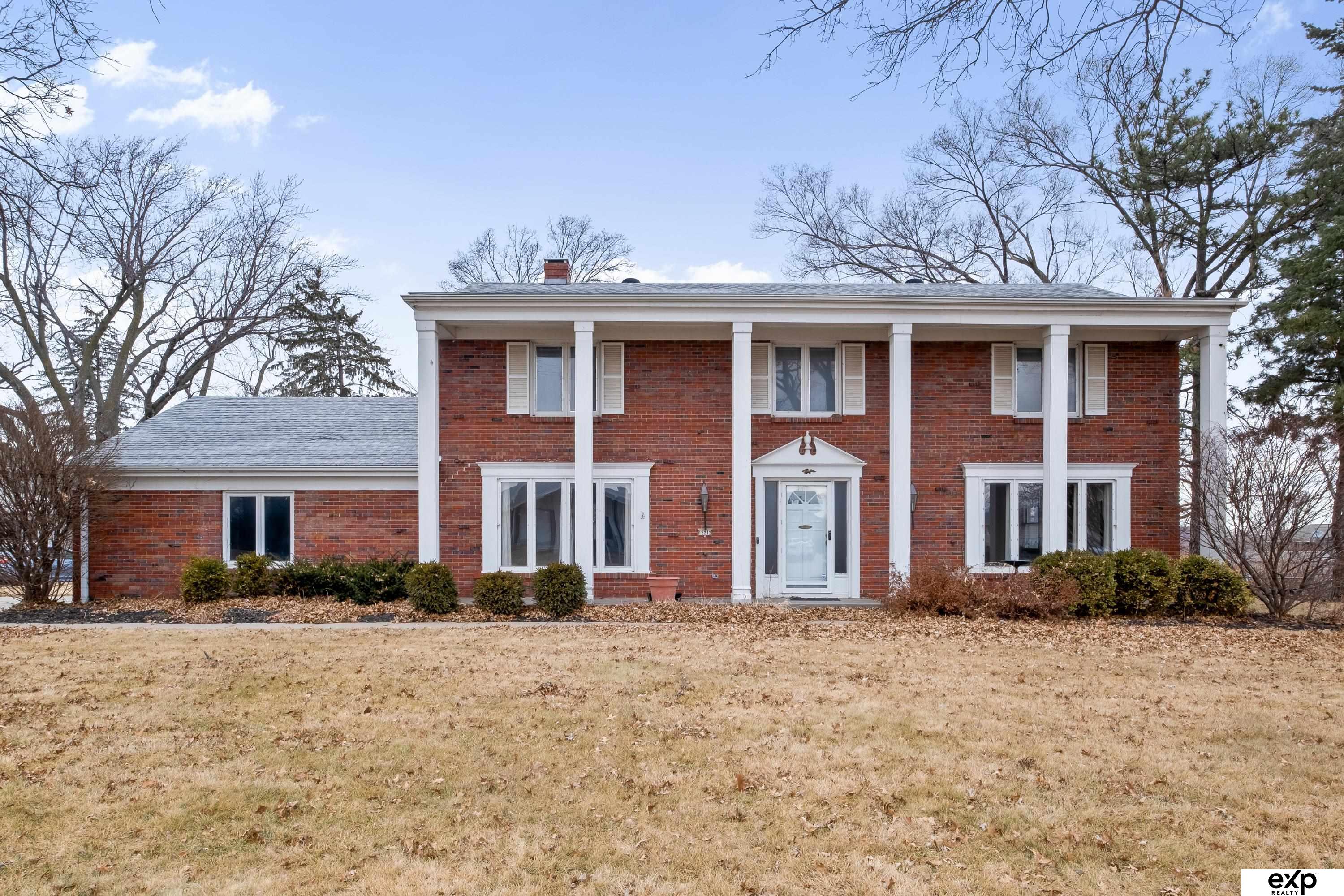 This beautifully designed home is a true work of art, showcasing unique character and craftsmanship by a local Omaha architect. Gorgeous hardwood floors flow throughout the spacious layout, creating warmth and elegance. The inviting fireplace off the kitchen adds a cozy touch, perfect for gatherings. Convenient main-floor laundry adds to the home’s functionality. With 4 bedrooms, 5 bathrooms, and a large lot, this home offers endless potential to make it your own. The expansive basement is ideal for entertaining, providing ample space for gatherings or relaxation. Don’t miss this incredible opportunity to turn this stunning property into your dream home! HOME has been virtually staged for your inspiration!!