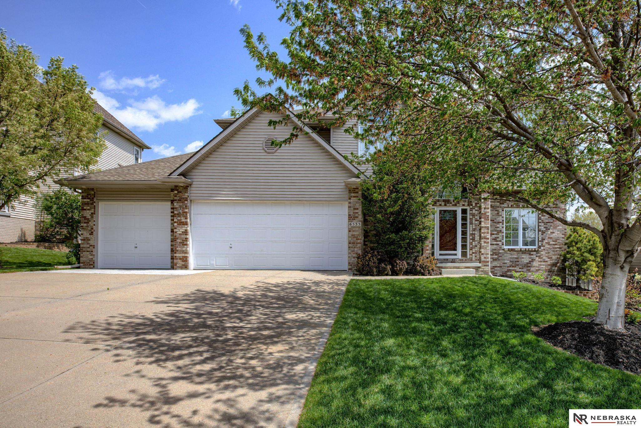 Broker/Agent Open House: Thursday, 5/1/25 from 11:30 AM – 2:30 PM Neighborhood Preview: Thursday, 5/1/25 from 2:30 PM – 6:30 PM  Stunning 5-Bedroom, 4-Bathroom Two-Story with Inground Pool. Welcome to this beautifully designed two-story home, offering the perfect blend of space, style, and comfort. This home is made for modern living and effortless entertaining. The large primary suite is a true retreat, boasting vaulted ceilings, an oversized walk-in closet, and a luxurious spa-like bathroom complete with dual vanity, jacuzzi tub, skylight, and vaulted ceilings for added elegance. The open-concept main level flows seamlessly from the kitchen to the informal dining area and into the inviting family room—ideal for hosting or relaxing. Upstairs, enjoy the convenience of second-floor laundry! Head down to the walkout basement, where a custom wet bar sets the scene for unforgettable gatherings, especially during summer pool parties around your private inground pool.