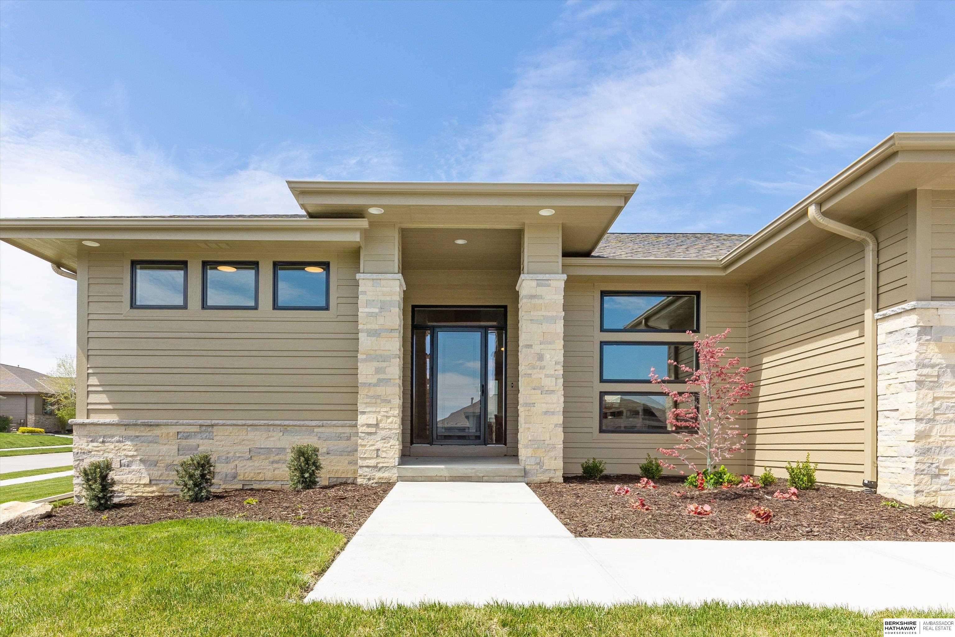 New construction nestled in sought-after Windgate Ranch! This ranch-style home features soaring ceilings, wood floors, granite countertops, and stainless steel appliances. The primary suite is complete with double sinks, heated tile floors, a free-standing tub, and a walk-in closet with a built-in dresser. The lower level is perfect for entertaining with a rec room, game room, wet bar, and a stunning temperature-controlled wine cellar. The backyard would be perfect for a pool - ask for details!