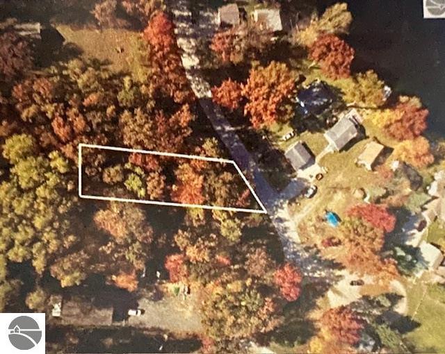 Lake of the Hills lake view! Just under 1/2 acre only 200' from a waterfront park for launch and docking. Excellent fishing lake! Quiet, no wake boating. Pontoons okay.  Located in Central Michigan. Just 15 minutes west of Mt. Pleasant. Seller is a licensed Broker in Michigan.