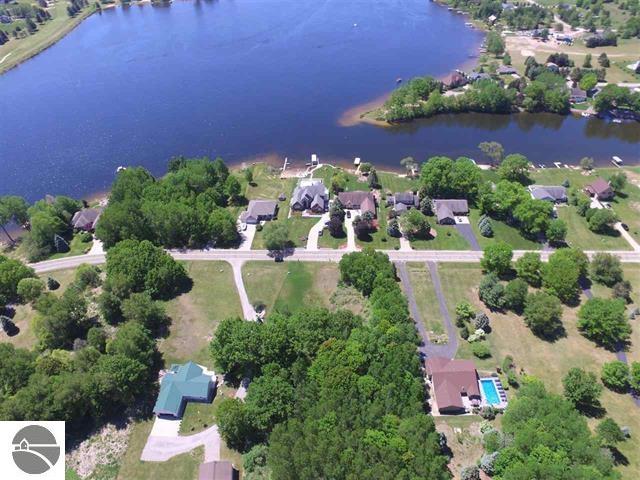 LAKE VIEW AT LAKE ISABELLA! This oversize lot is 2.6 acres. Large enough for home, garage, and accessory building for all your toys. Desirable neighborhood just off Coldwater Rd at the north end of the lake. Lot has underground utilities at the road, including natural gas. Boat Docking at any waterfront park. Boat Storage. Camp Ground. Pavilions. Swimming Beaches. The Pines Golf Course nearby. Lake Isabella is a private all-sports lake in central Michigan only 15 minutes west of Mt. Pleasant. Boat, fish, swim, enjoy!