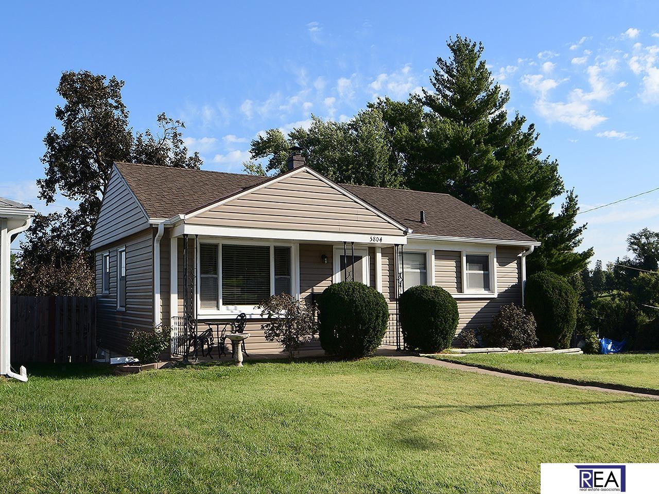 Contract Pending OPEN HOUSE 10/ 12 FROM 12:00 PM - 1:30 PM. Don’t miss a great opportunity to own this cozy 3-bedroom, 2-bathroom raised ranch on a desirable corner lot! Priced to sell, this home is perfect for first-time buyers or anyone looking for a smart investment. Built in 1953, this well-maintained home features a new roof, newer siding with additional insulation, and beautiful wood flooring throughout the main floor. Enjoy a bright and functional layout, with a bonus room, finished basement, and an attached 1-car garage for added convenience. The mostly flat lot offers easy outdoor maintenance and room to garden, play, or relax. Located in a quiet neighborhood with quick access to local amenities, this home is move-in ready. Check this home out today!