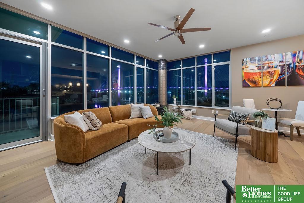 This absolutely stunning condo is now available! This property has 1,728 sprawling square feet that look over the pedestrian bridge and has an unbeatable view of the downtown skyline. Everything is located on one convenient main floor, every room in the home has magnificent floor to ceiling windows. The kitchen has ample cabinet space, a breakfast bar type island and creates an open concept vibe with the living room and dining room. The primary suite is immaculate, spacious, with windows overlooking the water. The primary bath has everything one could want; Double sinks, a whirlpool tub, walk-in shower, TV set up, and so much more. The in-unit laundry room comes fully equipped as they stay with the property. In addition to the resort feel, the property provides full access to the private club house and other amenities. This property truly takes downtown living to the next level!