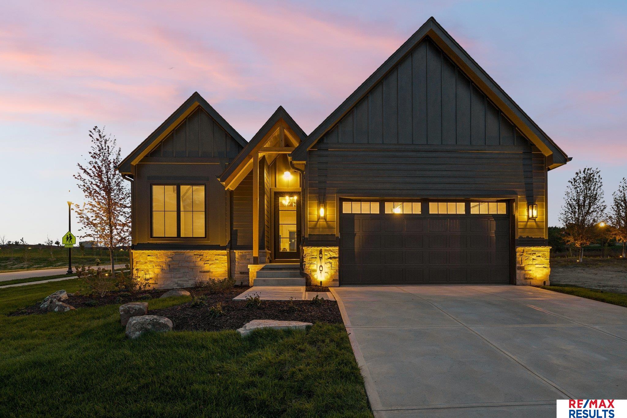 BRAND NEW! OPEN SUNDAY 1-4! Pohlad Custom Homes, Inc. is thrilled to present their newest villa, The Elmwood, is now ready for its owners to downsize in style! Located in South Streams, the area's premier community, this beautiful home offers modern design, quality craftsmanship & an unbeatable location just off of 204th St & George B. Lake Parkway. This spacious ranch offers a serene & luxurious living experience featuring over 1700 sq. ft. of open living space on the main level, complete with cozy fireplace, covered patio & attached 2-car garage. The sumptuous main-level primary bedroom features a large walk-in closet with custom shelving & convenient laundry area. The primary bathroom includes dual vanities & fully tiled walk-in shower, providing a spa-like retreat. The 1200 sq. ft. lower level has a lounge w/bar, 2 bedrooms & bath. Each villa has its own private driveway for access. Pohlad Custom Homes, Inc. is the exclusive builder for South Streams Residences. Agents have equity.