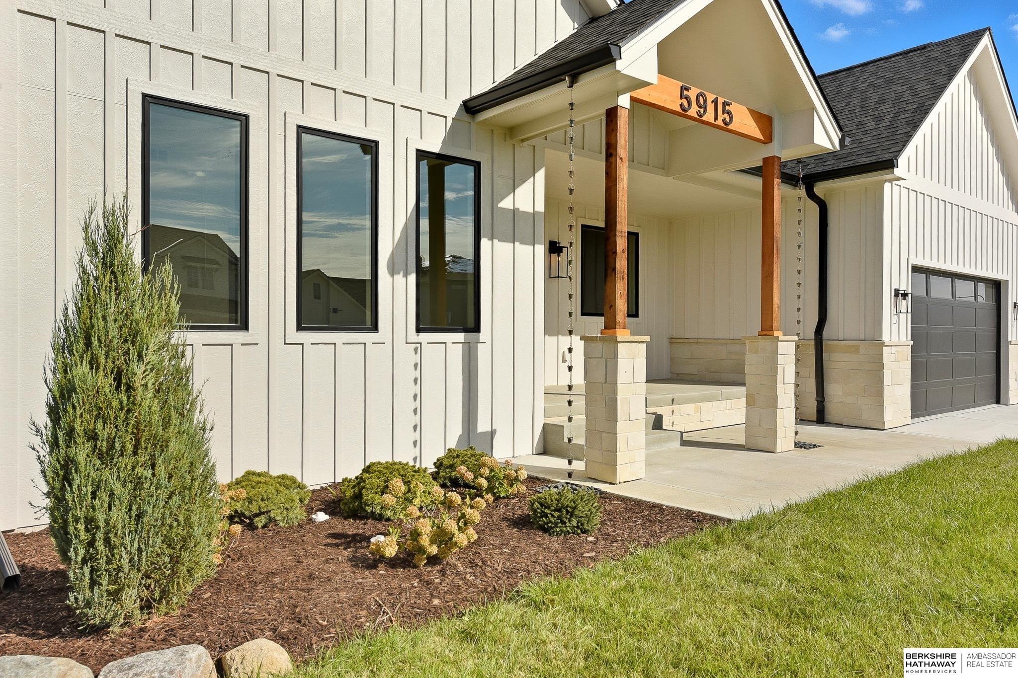 Exquisite Custom Home by Willow Custom Homes. This beautifully designed & quality-built home offers an exceptional blend of luxury, comfort & functionality. Featuring a dream kitchen which is a chef's delight, showcasing a gorgeous center island, a gas range, an eat-in dining space & a spacious walk-in pantry with ample prep counter space. The great room is designed for seamless indoor-outdoor living, with Pella double sliding doors that open to a covered patio, perfect for entertaining. The designer primary suite is a true retreat, featuring a stylish accent wall, a spa-like bathroom with a zero-entry shower, a freestanding soaker tub, plus a walk-in closet w/ a center island  & direct access to the laundry room. The finished lower level provides additional living space, complete w/ a wet bar, a wide-open recreation area, & two additional bedrooms. Situated on a flat lot, this home offers the perfect combination of sophistication and practicality. Don't miss this opportunity.