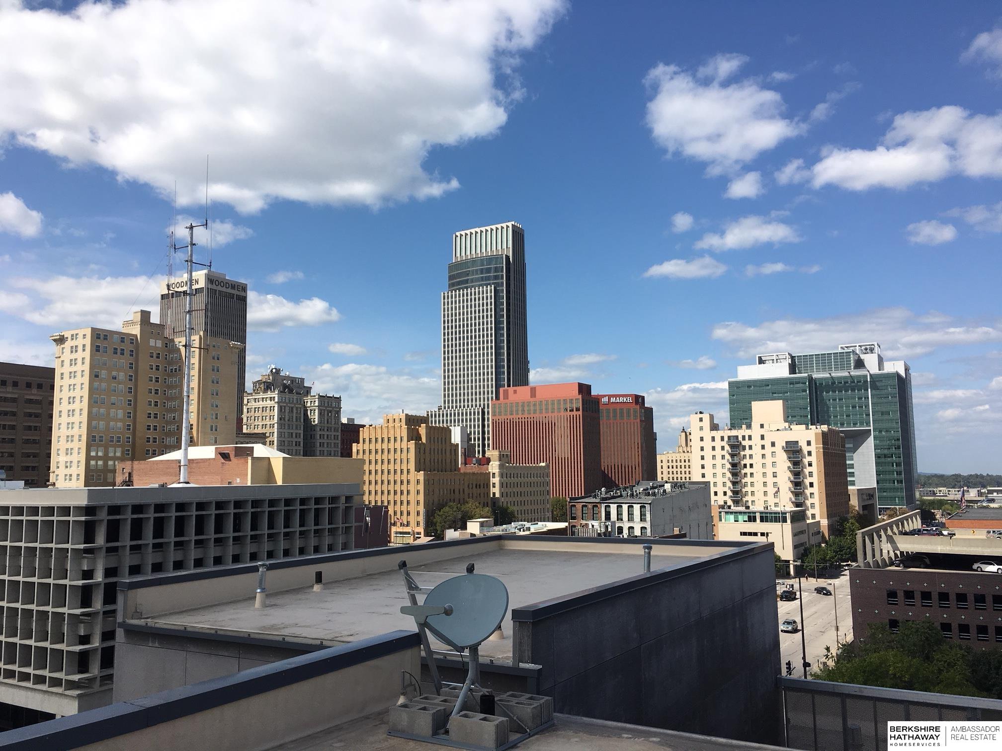 This one-of-a-kind penthouse is the only 2-story white box condo in Omaha, offering you the freedom to craft a custom floor plan and create a truly unique space. Design the second floor as an entertainment suite with a full kitchen, a bright artist studio, or a peaceful meditation retreat. With unlimited potential and 14-foot ceilings, this condo is a blank canvas. Plus, enjoy your private rooftop terrace with stunning downtown views. Future renderings are just proposals and not included in the price.