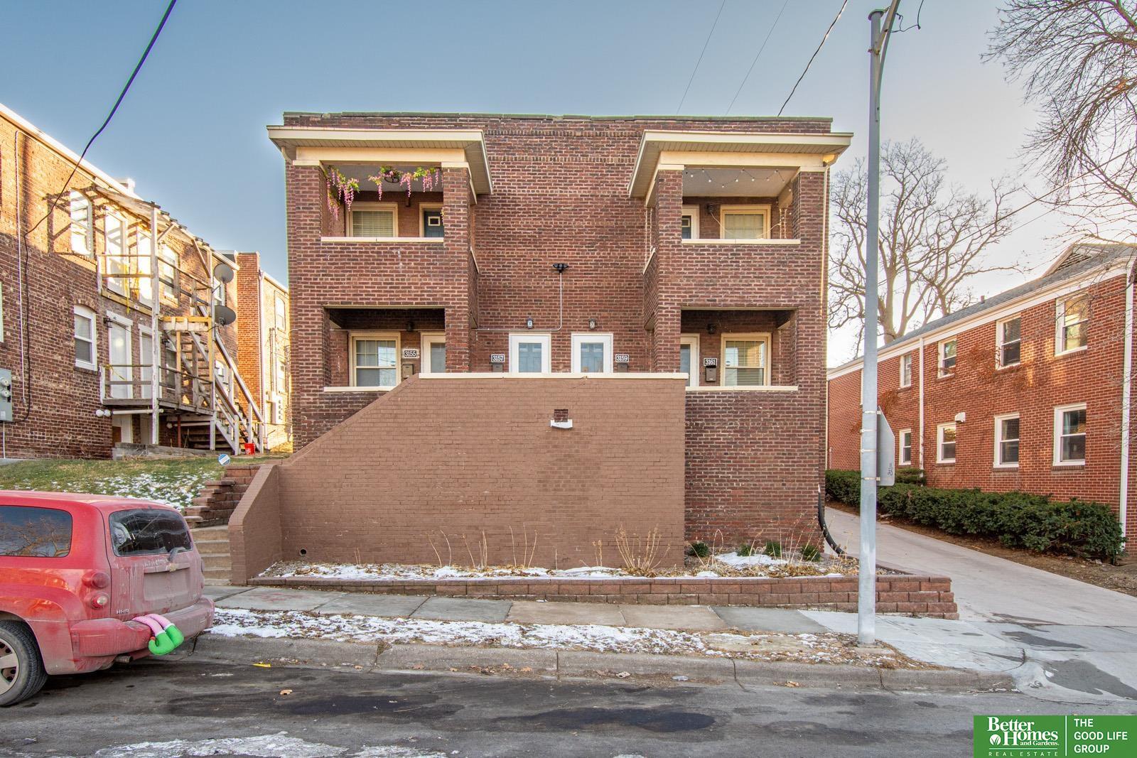 Located just steps from the energy of Omaha’s expanding streetcar corridor, this fully leased four-unit property presents a true turnkey investment opportunity. All units have been refreshed with modern paint, updated fixtures, contemporary lighting, and ceiling fans—creating bright, low-maintenance spaces that attract and retain tenants. Kitchens are well equipped with dishwashers, gas ranges, refrigerators, and microwaves, with select units offering additional cabinetry, expanded counter space, and stainless appliances. An on-site laundry room with mobile pay adds both convenience and supplemental income. Recent capital improvements include new doors, electronic locks, security cameras, updated mailboxes, a brand-new sewer line, and improved electrical service. A stabilized asset with solid cash flow and long-term upside.