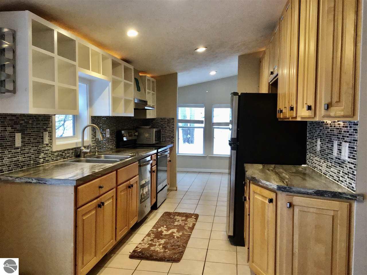 5224 NW River Pine Drive, Rapid City, MI 49676 photo 2 of 28