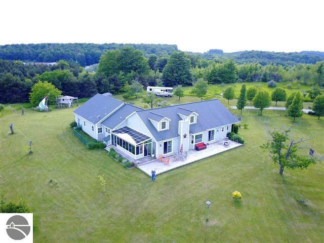2555 N Evergreen Valley Drive, Suttons Bay, MI 49682 photo 1 of 72
