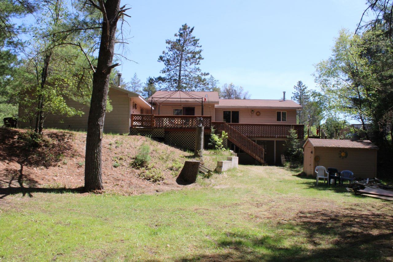 Whether your looking for a prime recreation area, or that special place to call home. Located in Garfield Twp, known for its abundance of State Land and nature at its best. I have heard great things about the fantastic neighbors, no doubt they would say the same about the Sellers. Many renovations & Master Bedroom suite addition during the 20 + year ownership,( 200 amp Breaker Box, Solid Raise Panel Oak Doors & Custom Oak Trim, Walk-in Closet & Private Bathroom, New Kitchen Cabinets , Appliances & More ) Sellers will relocate to a warmer winter climate and the lucky new owners will enjoy many years of making memories. This is not a drive by, qualified Buyers only, please...