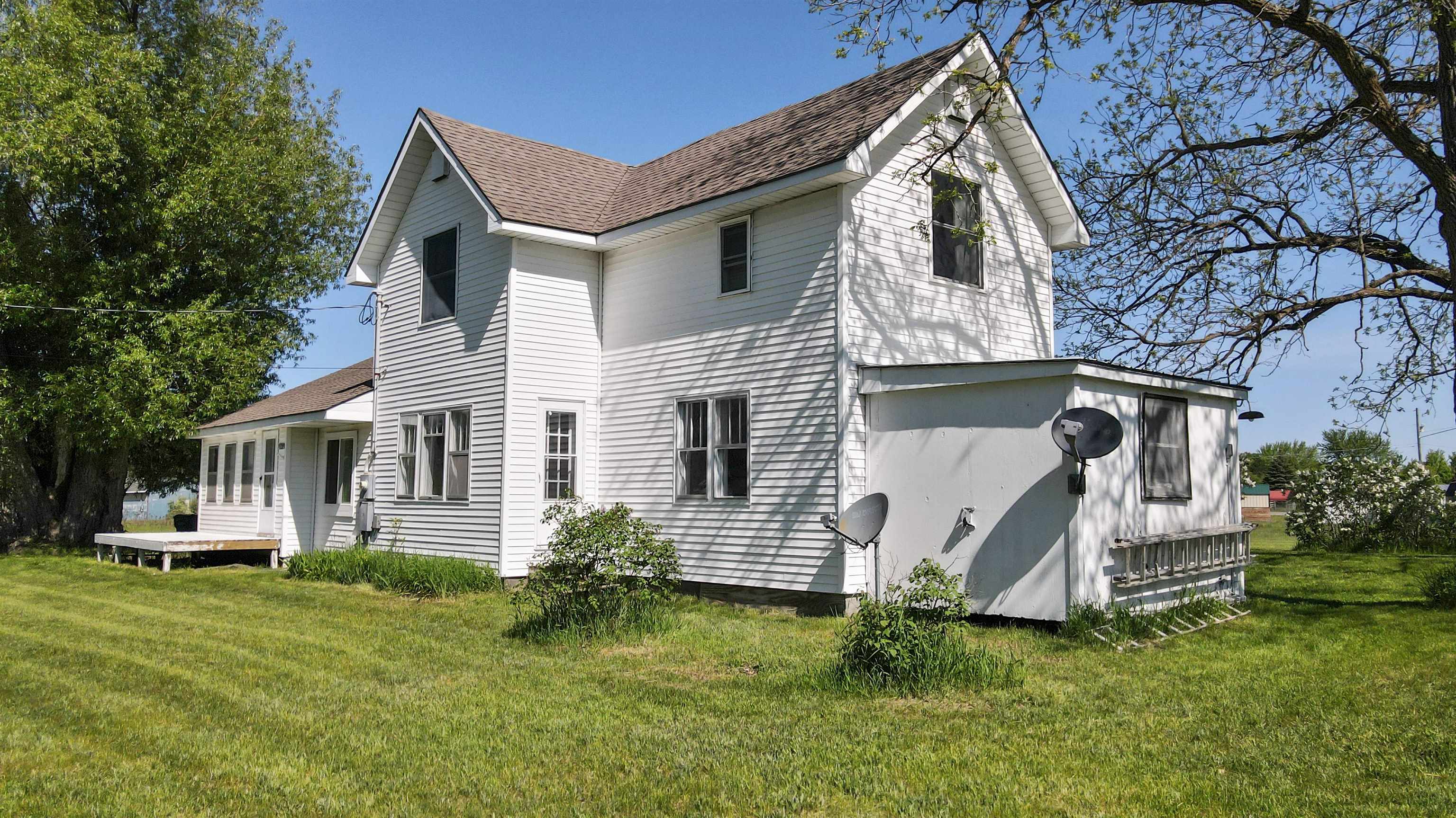Looking for a spacious home with a little acreage, yet want to be close to everything? Well look no further! This updated charming farm home sits on just over 3.5 acres and is conveniently located just West of Chums Corners about 1 mile from Interlochen and just a few miles from Beautiful Interlochen State Park on Duck Lake. Many updates within the last 2-6 years, including kitchen cabinets and butcher bock counters, bath updates, new appliances, flooring, 2 new exterior doors, water heater and furnace, septic, and a new roof in 2015. Beautiful level lot to accomodate all of your gardening desires plus you will enjoy a dozen fruit trees (pear and various apple) for those scrumptious fall pies! 1.5 story barn can house all your tools and outdoor equipment and is large enough for 1 car. Chickens and Ducks are allowed. Schedule your appointment today!