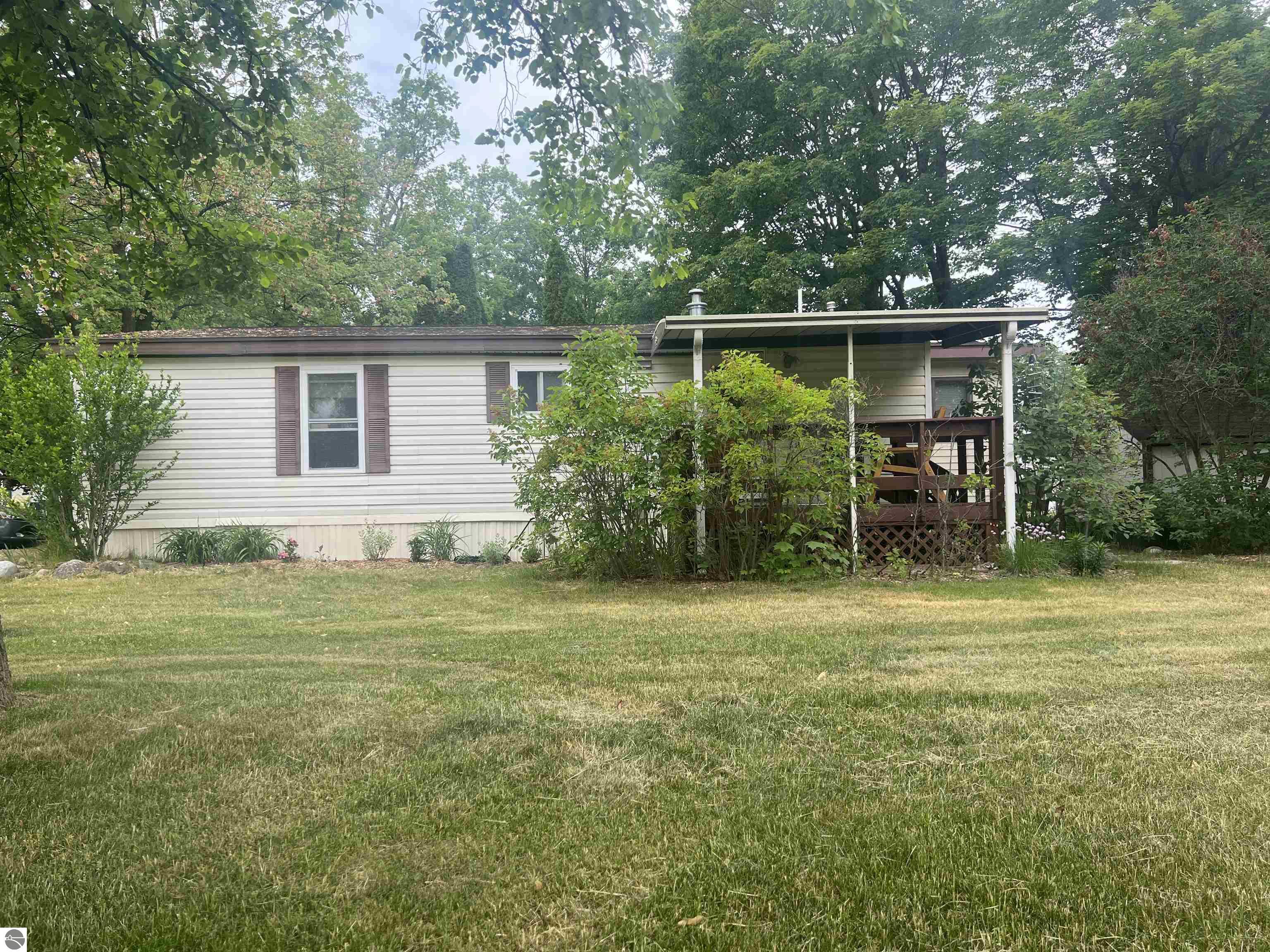 706 Golf View Circle, Elk Rapids, MI 49629 — front exterior