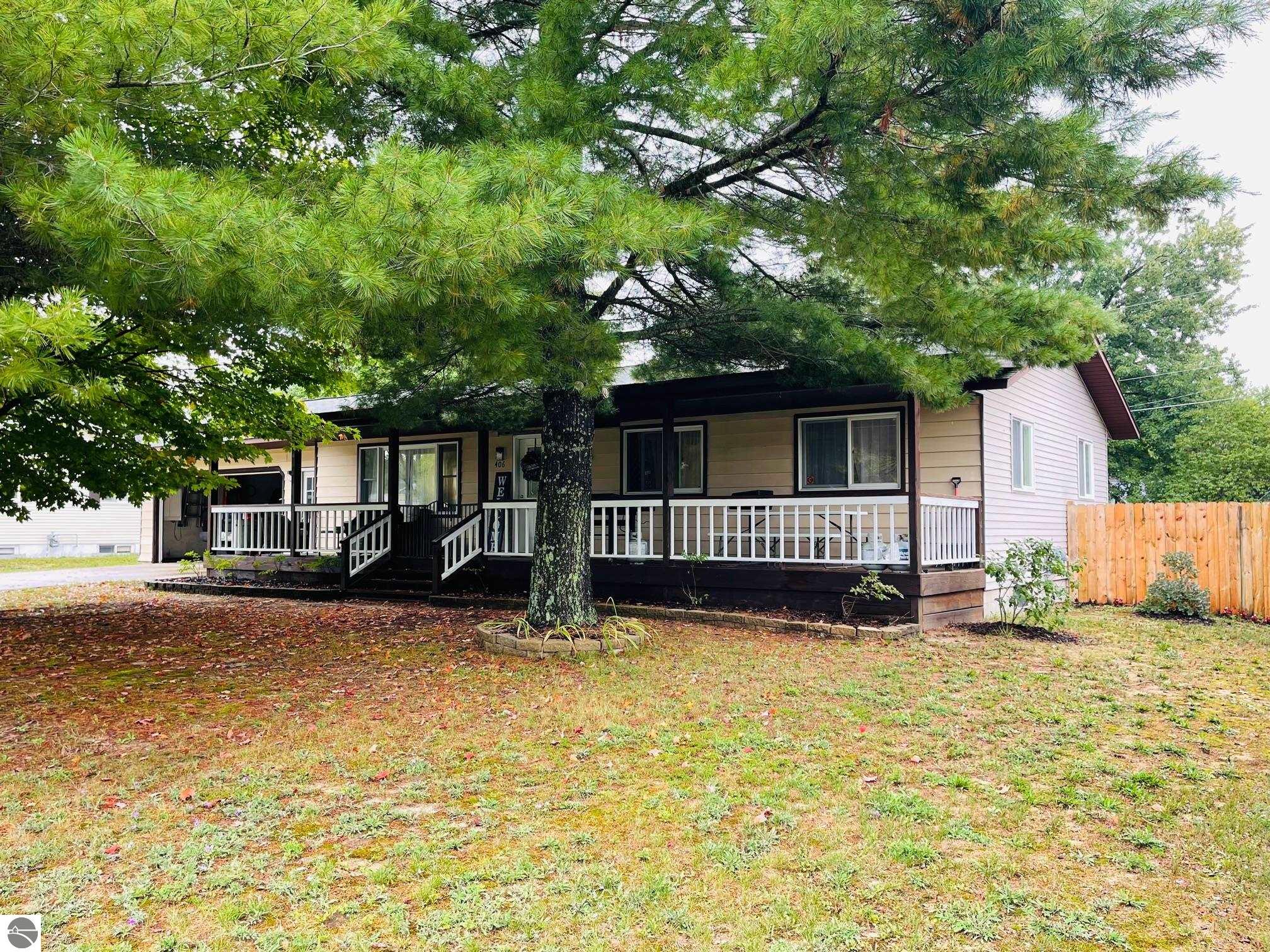 406 Riverdale, Mancelona, MI 49659 — front exterior