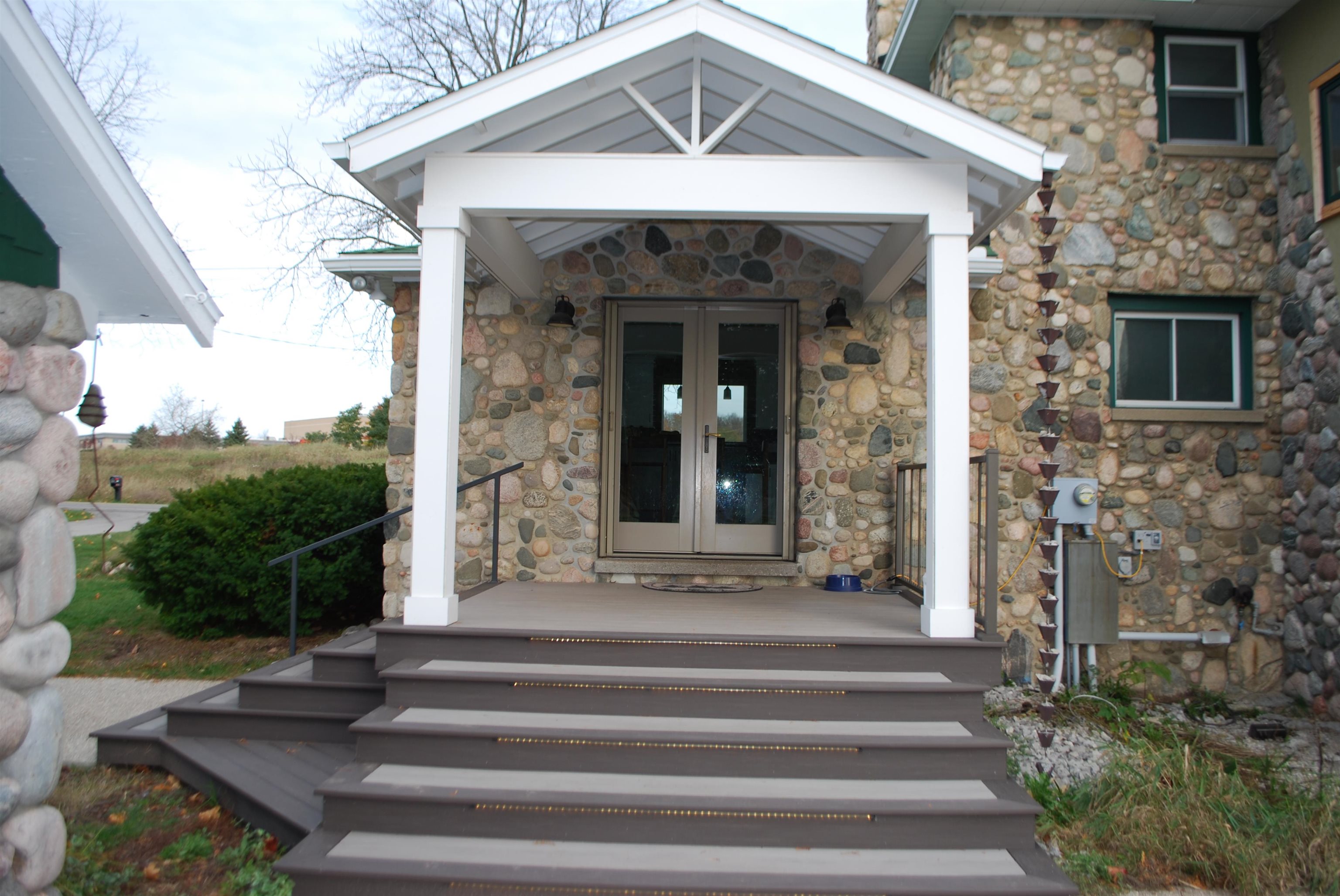 This amazing estate consists of a Modern Fieldstone Farmhouse, a 3-Car Garage, a 40' x 80' Dream Pole Barn, a Built-In Heated Swimming Pool, a 16' x 12' Garden Shed and 12 acres of land that includes 7 acres of invisible fencing for pets, a pond and an outdoor target range. Modern Fieldstone Farmhouse: The house includes many upgrades such as radiant heat floors, quartz heated countertops, wifi thermostats and more. An expansion/remodel has been roughed out (with all inspections approved), and the builder is willing to chat with you about finishing it to your specifications. Garage: The spacious 3-car garage is finished, heated, has epoxy floors, workbenches, lots of storage, a kitchenette and 4 overhead doors (3 in front, 1 in back). Dream Pole Barn: The 40' x 80' with 14-foot walls, 4 insulated overhead doors, completely insulated and finished interior with 2 x 8 tongue and groove gorgeous wood walls throughout, epoxy floors with drains, heated and air conditioned, separate utilities from the home. Great potential for storage income. And, more! There's potential to turn the property into an event center with branding and architectural plans already completed, which are included with the sale.