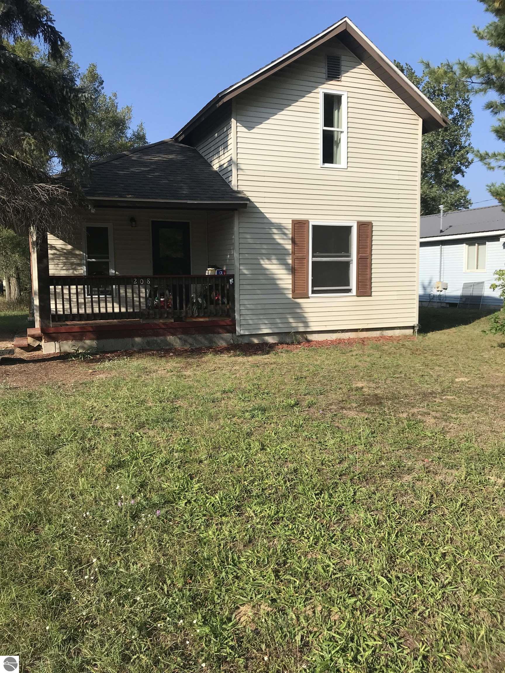 208 Kalkaska Street, Kalkaska, MI 49646 — front exterior
