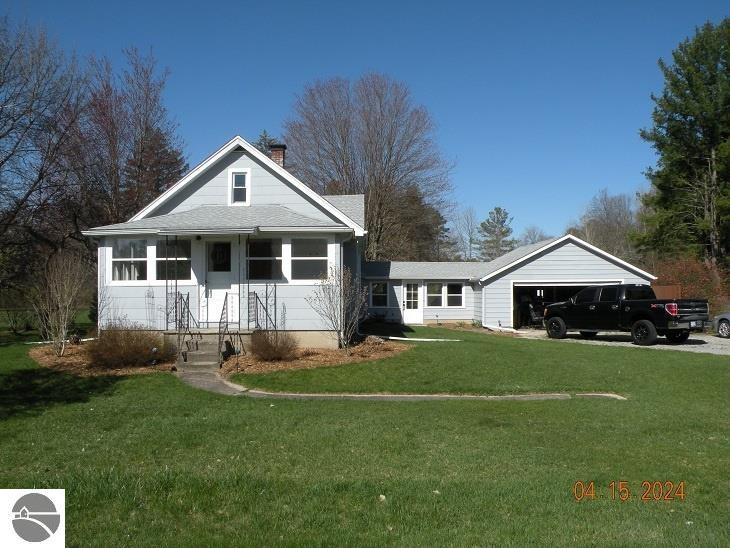 2299 N Smith Street, Sanford, MI 48657 — front exterior