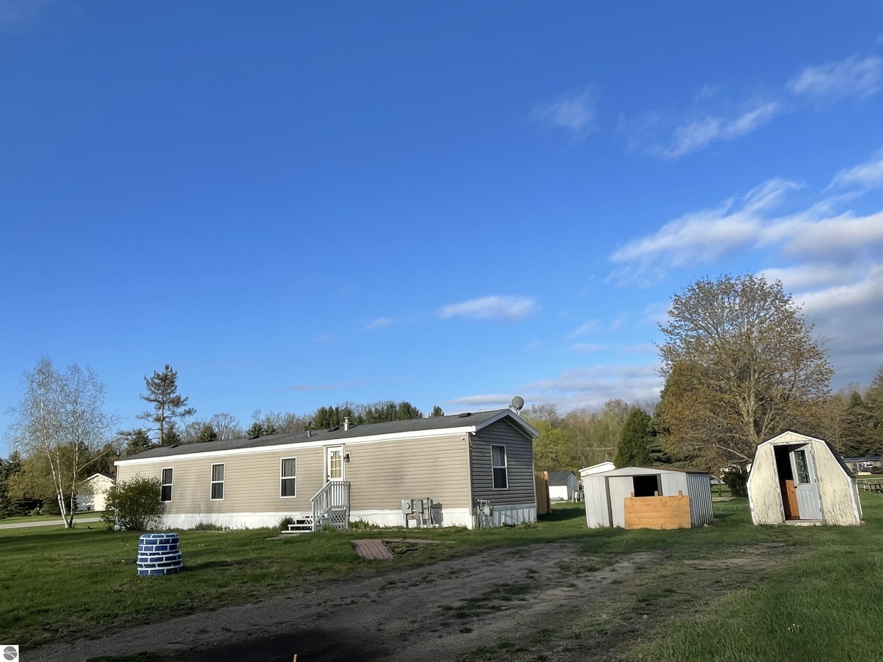 1000 Vallado Drive, Weidman, MI 48893 — front exterior