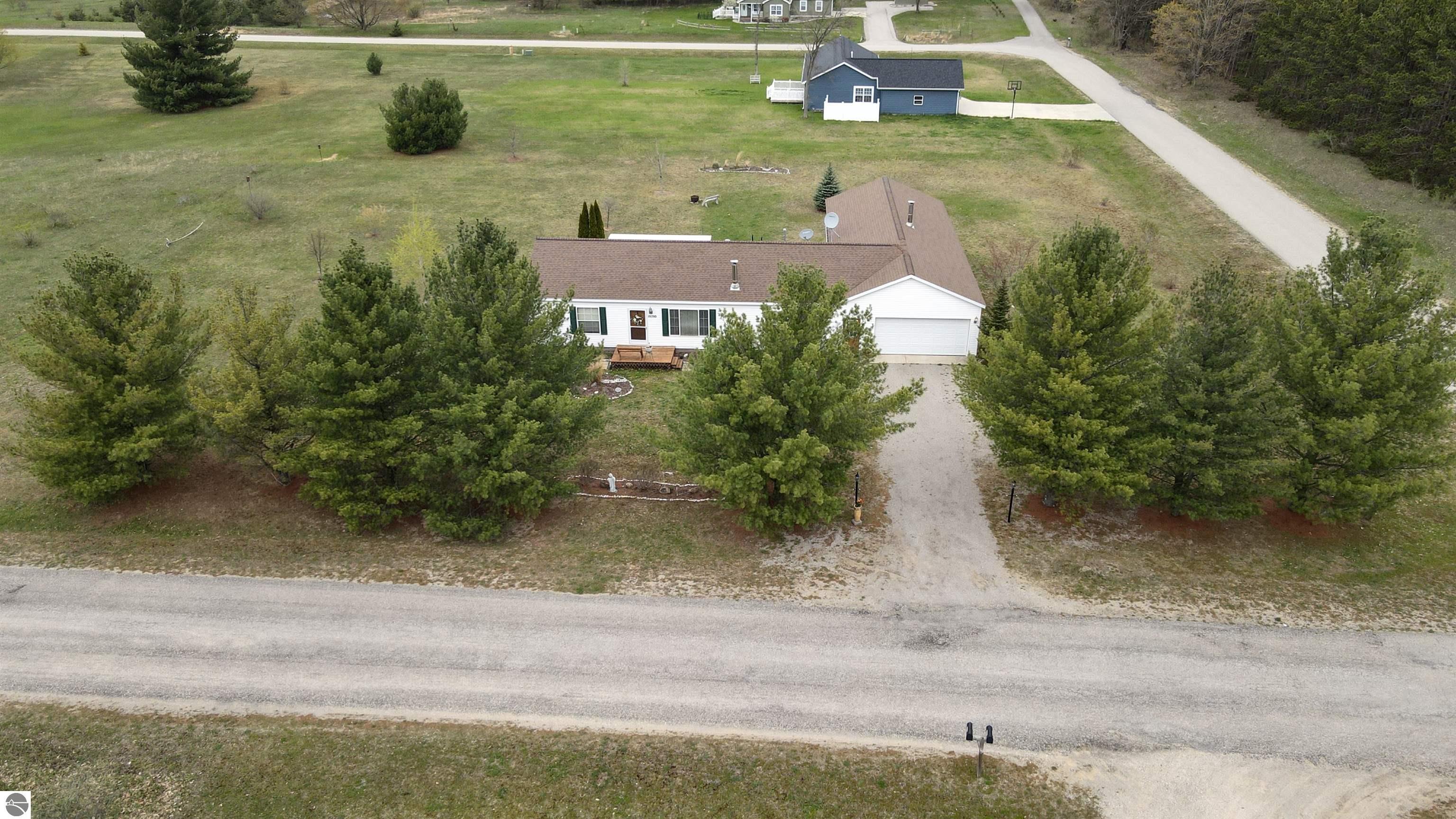 10700 Scenic Drive, Honor, MI 49640 — front exterior