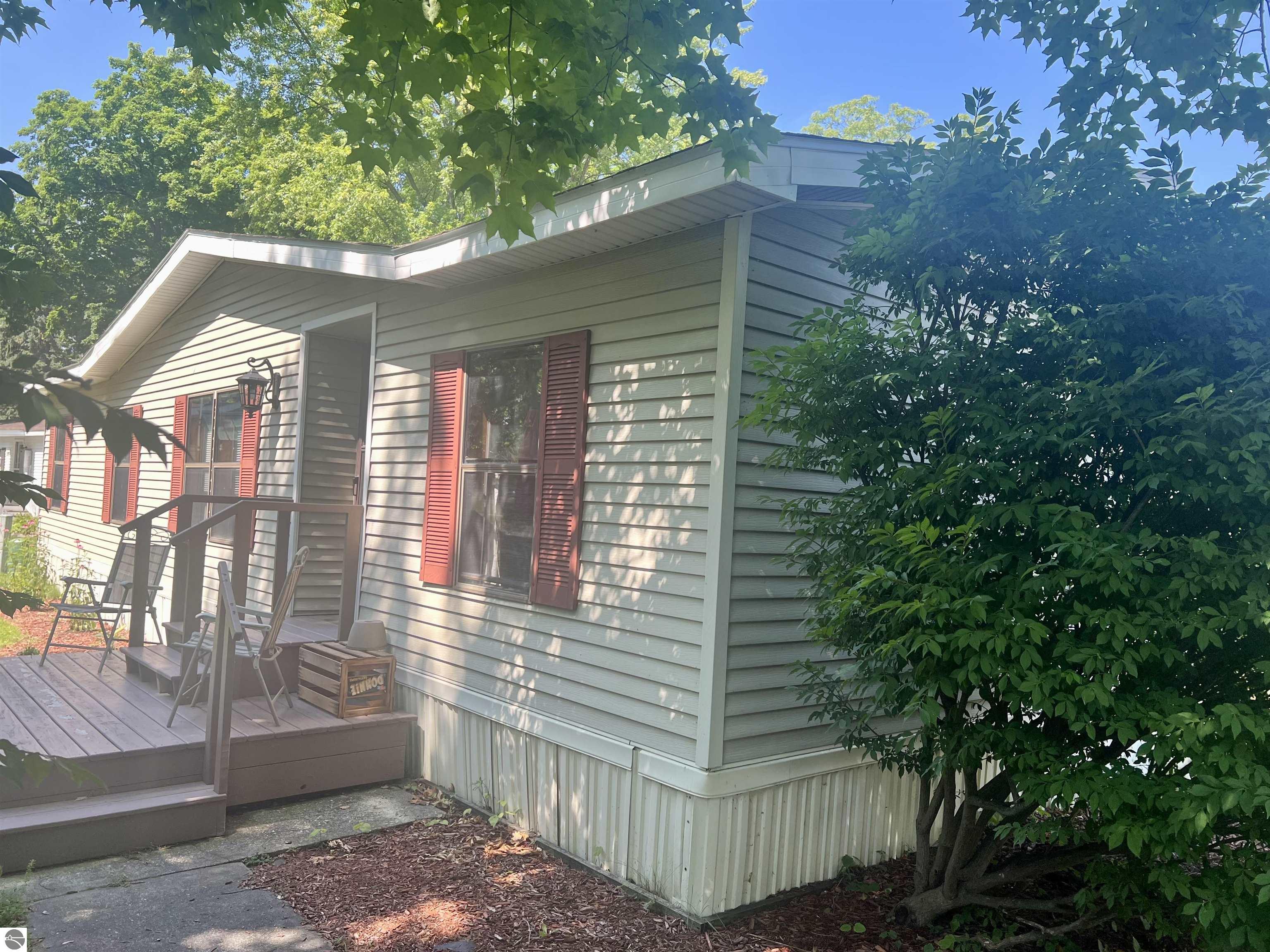 713 Golfview Circle, Elk Rapids, MI 49629 — front exterior