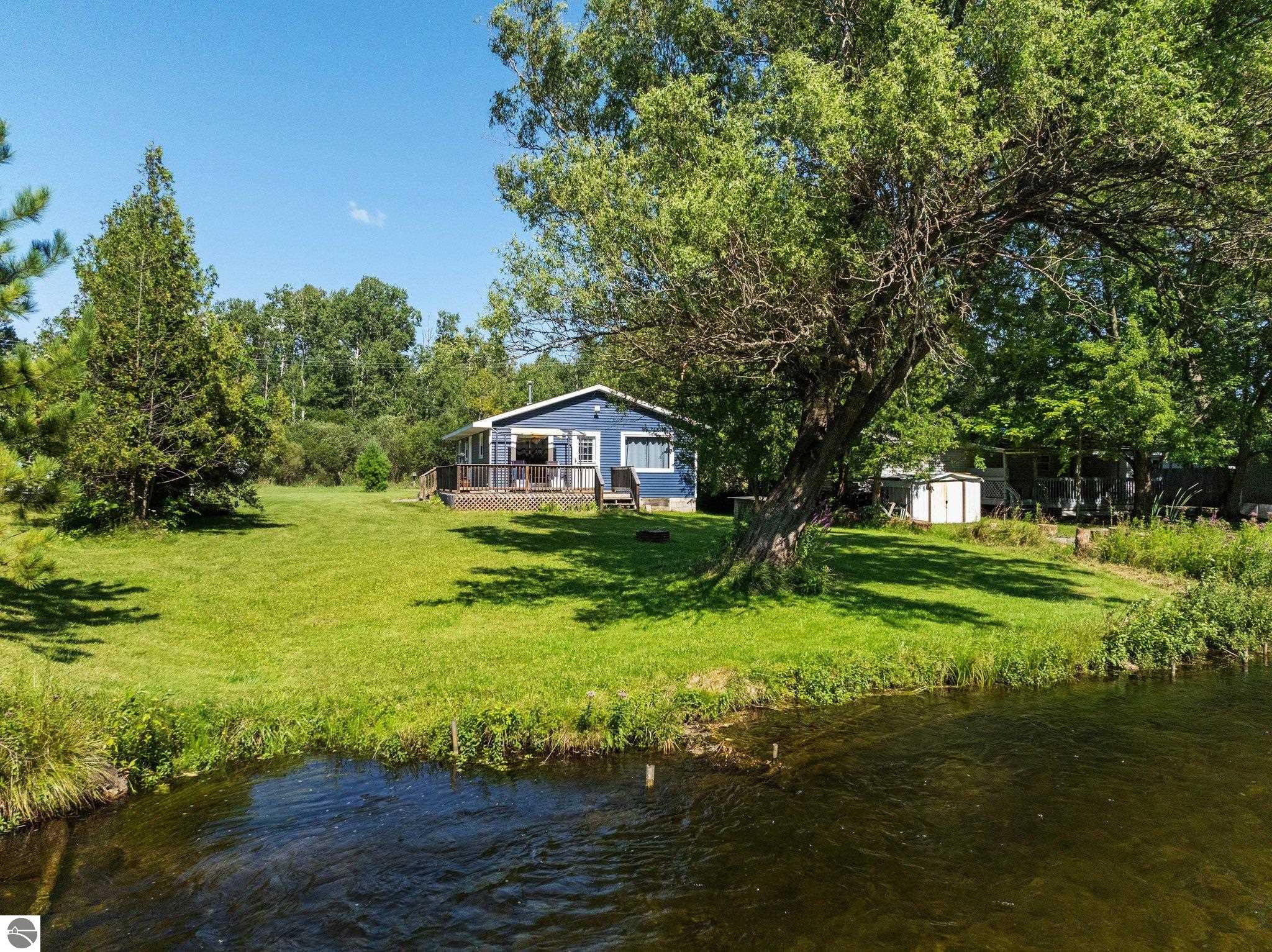 10791 Riverside Drive, Honor, MI 49640 — front exterior