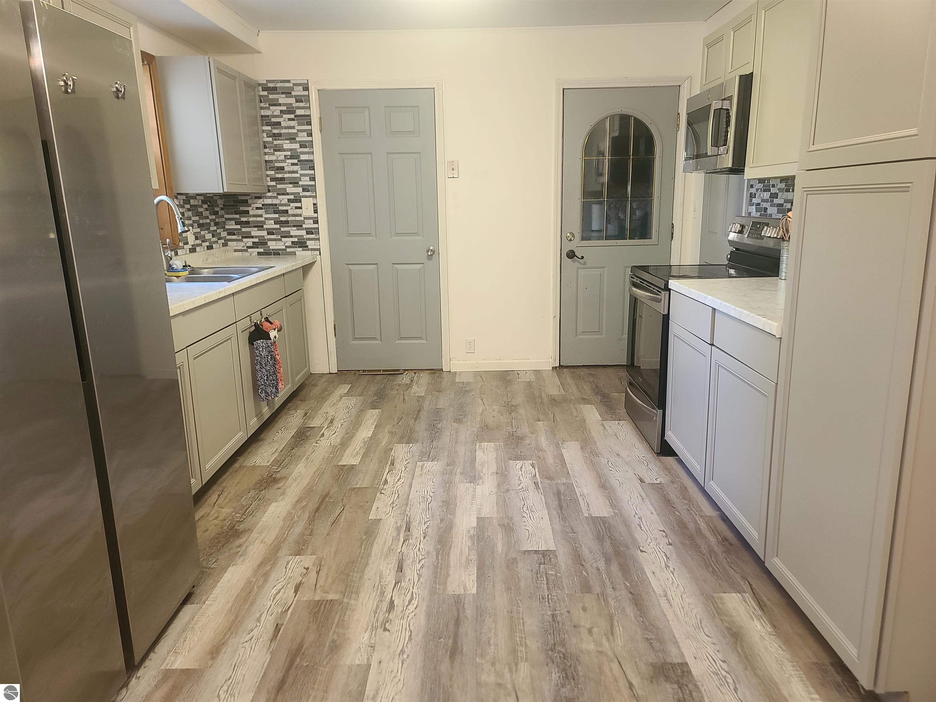 208 S Washington Street, Mancelona, MI 49659 — Photo 5
