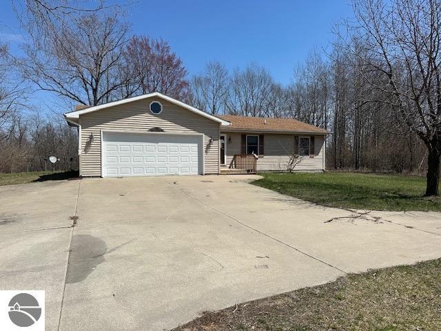 2003 Seabury Circle, Weidman, MI 48893 — front exterior