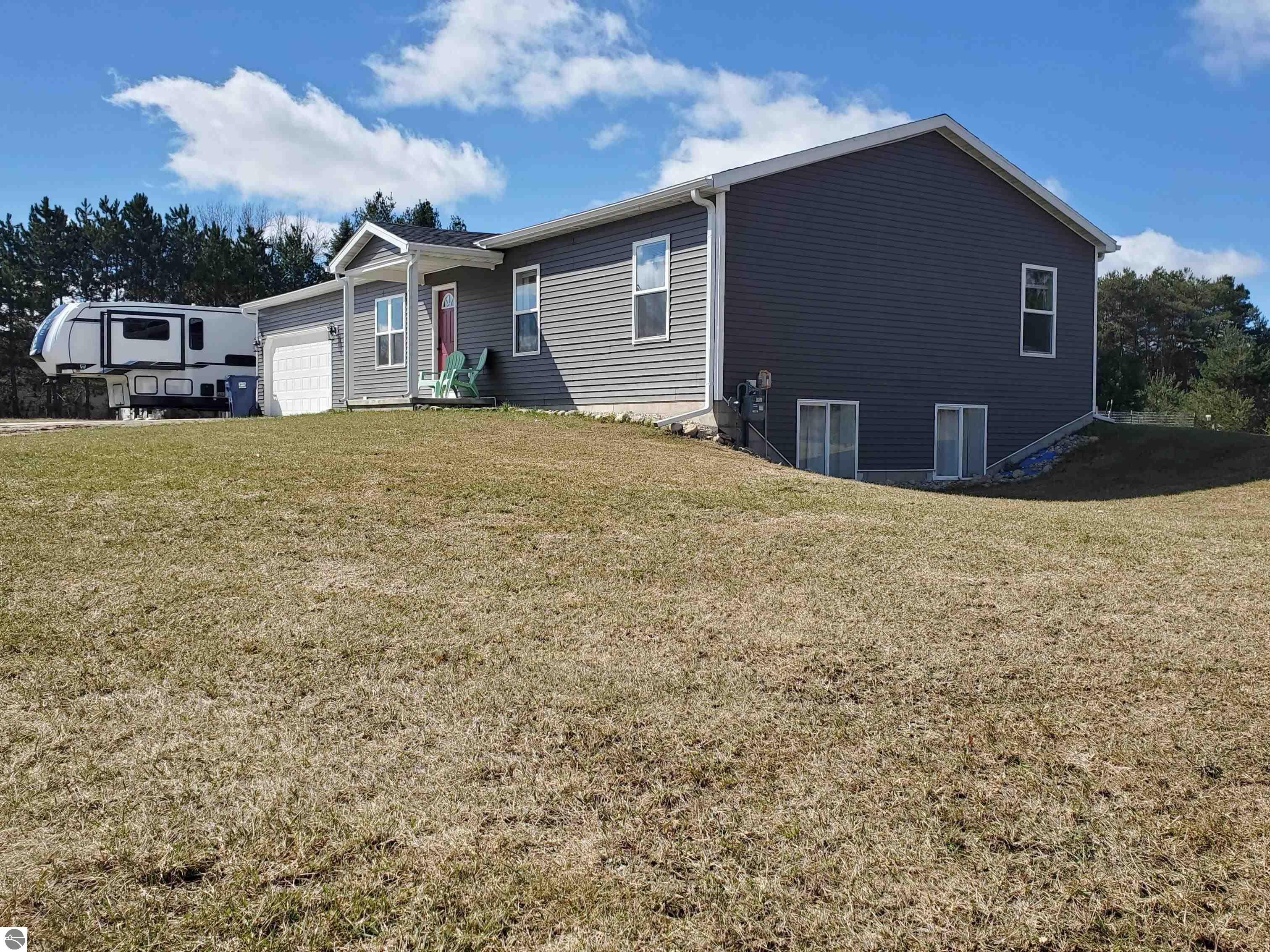 1025 Pyrenees Drive, Lake Isabella, MI 48893 — front exterior