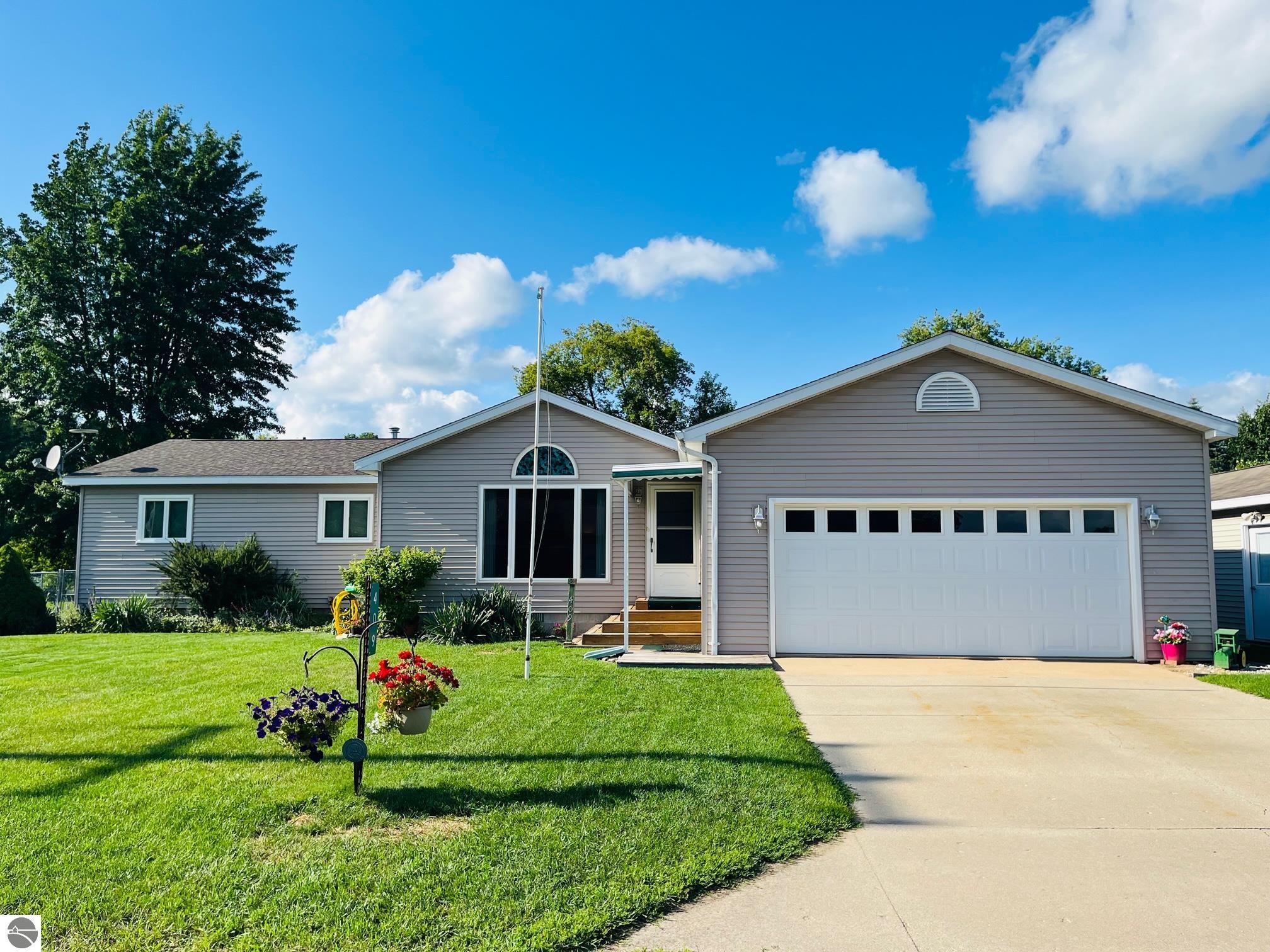 409 Fifth Street, Marion, MI 49665 — front exterior