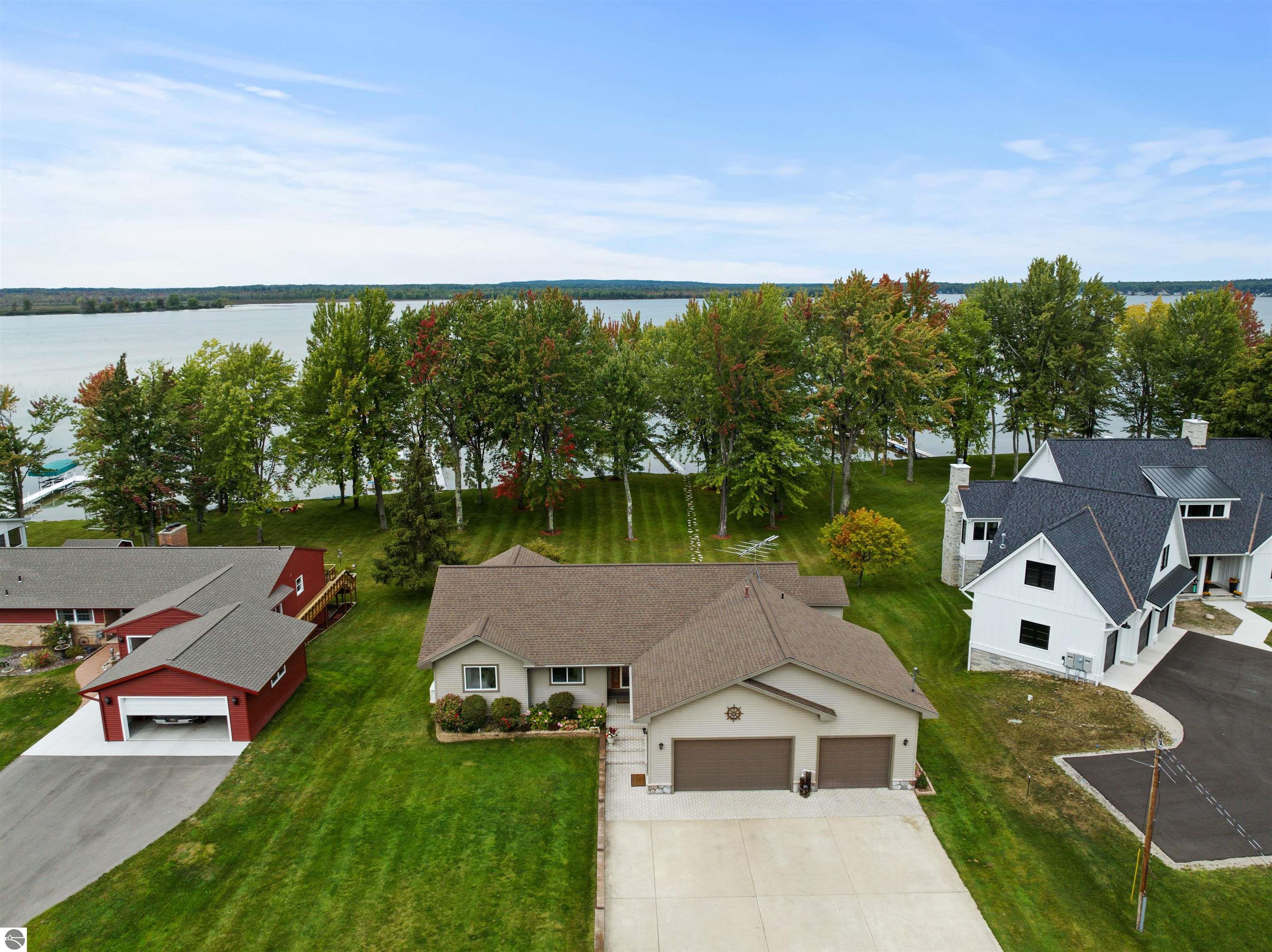 11246 Kings Point, Alanson, MI 49706 — front exterior