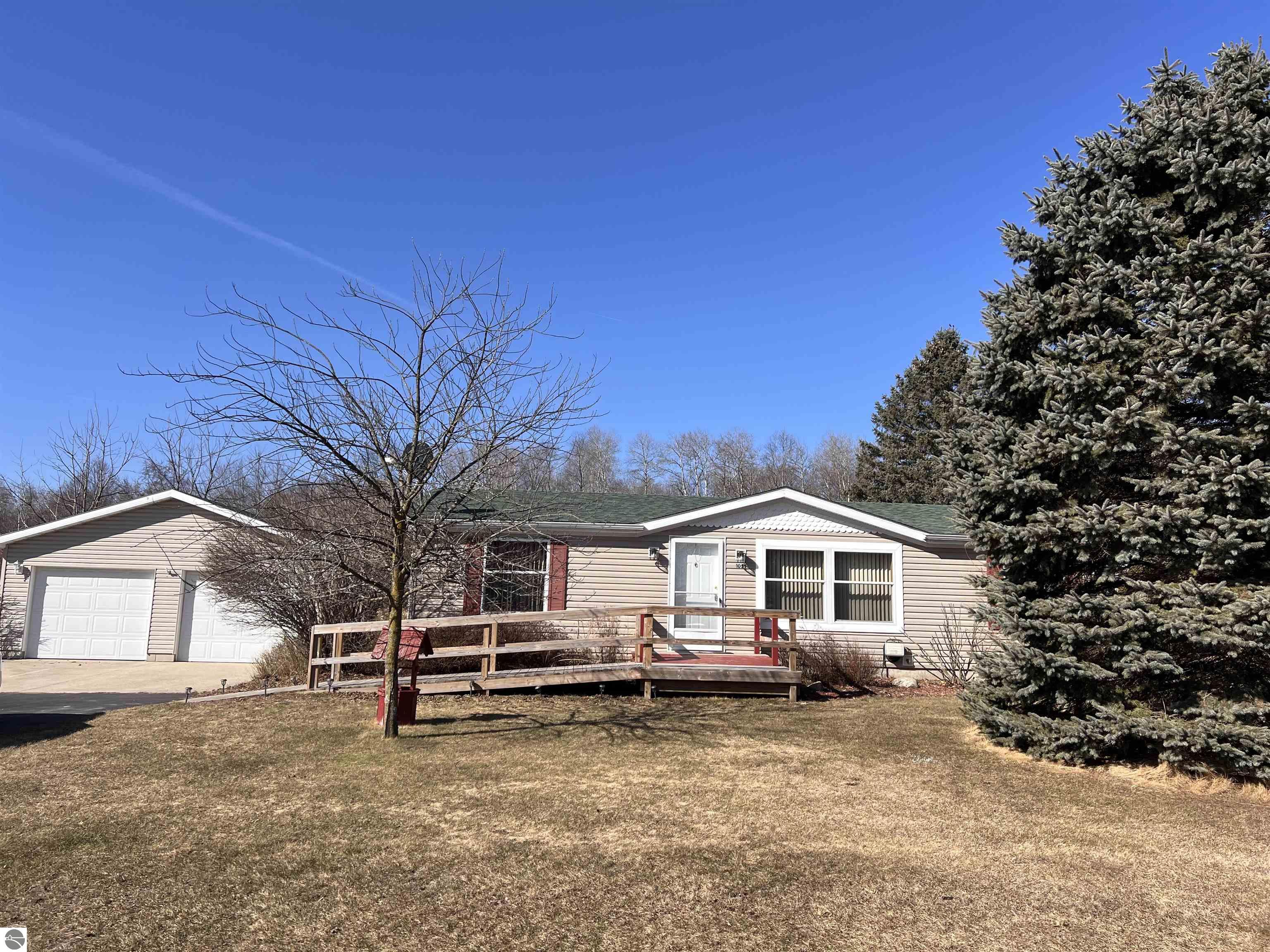 1051 Duquesa Drive, Weidman, MI 48893 — front exterior
