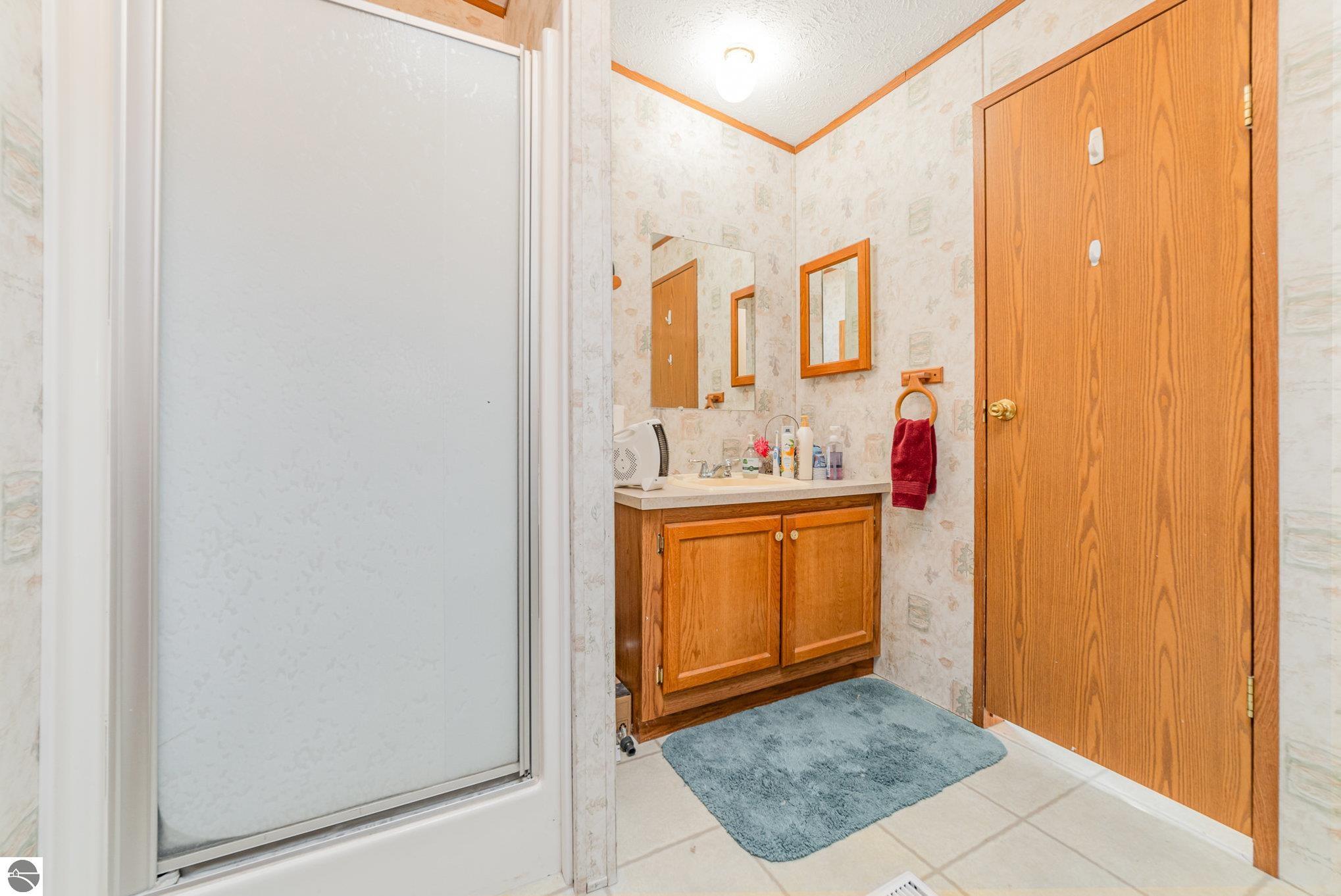 1051 Duquesa Drive, Weidman, MI 48893 — Photo 12