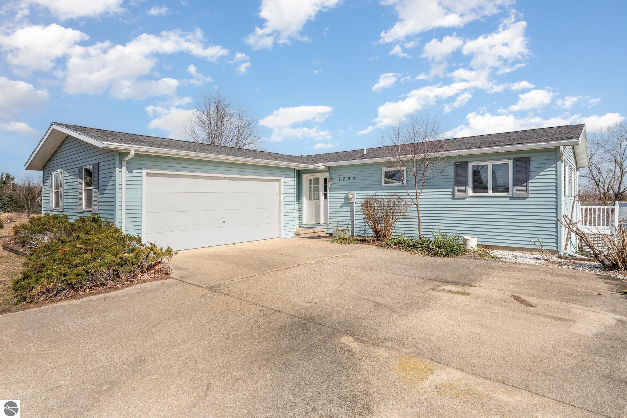 1046 Isabella Vista Drive, Weidman, MI 48893 — front exterior