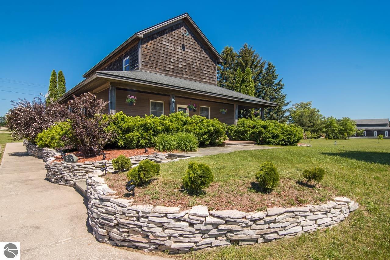 615 Tobias Road, Elmira, MI 49730 — front exterior