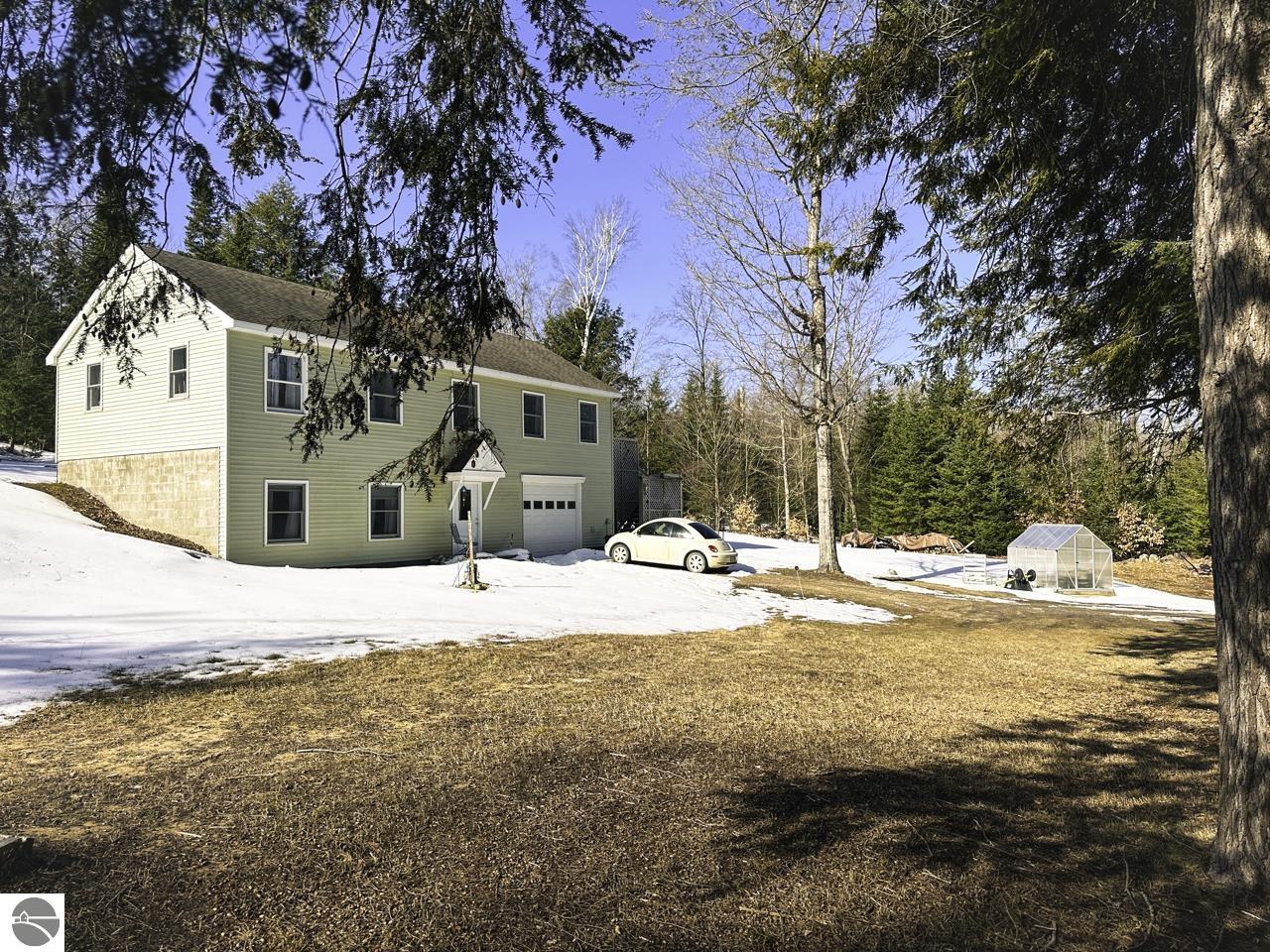 28280 Timber Valley Court, Beaver Island, MI 49782 — front exterior