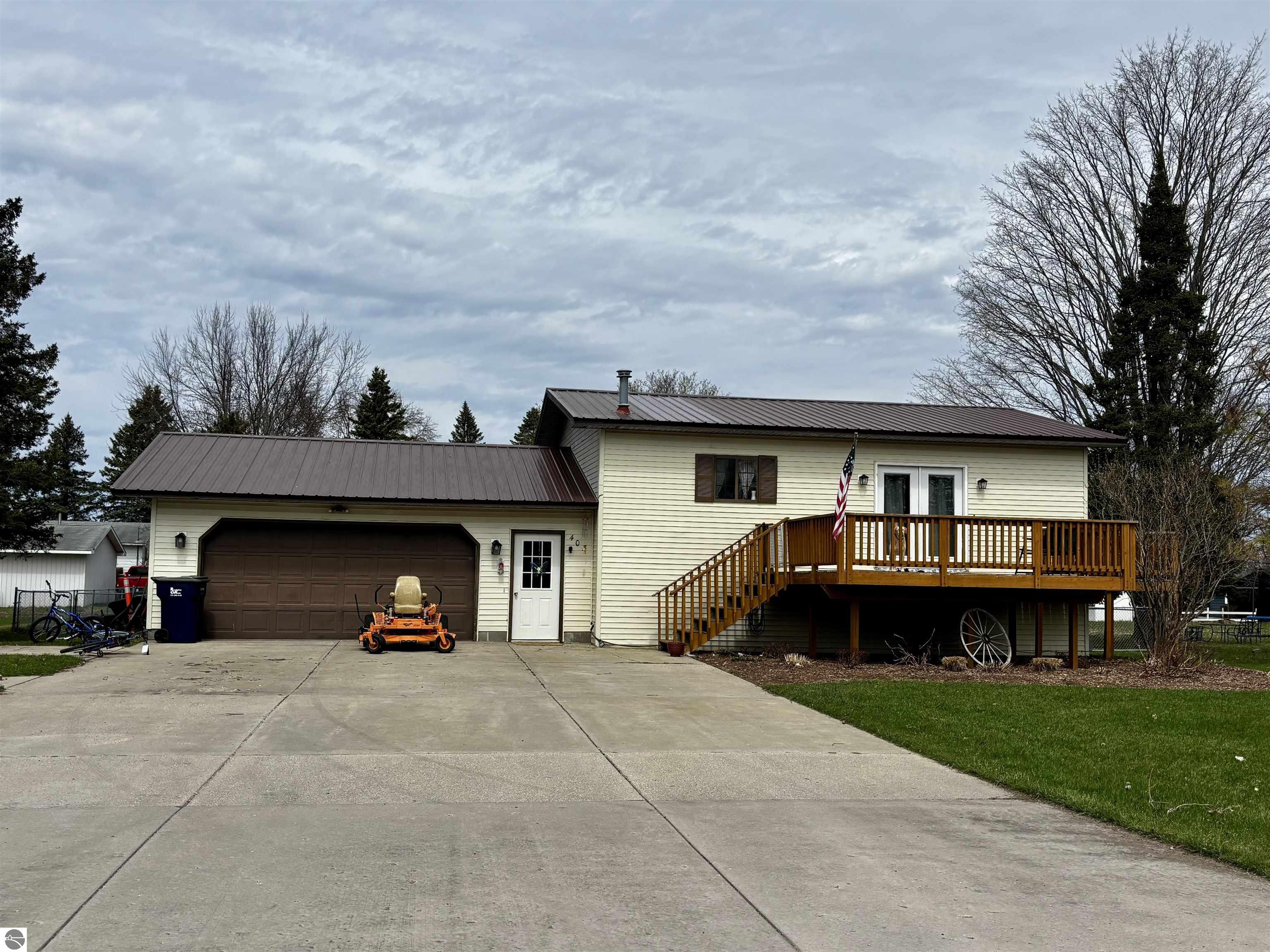 403 E Calhoun, Mancelona, MI 49659 — front exterior