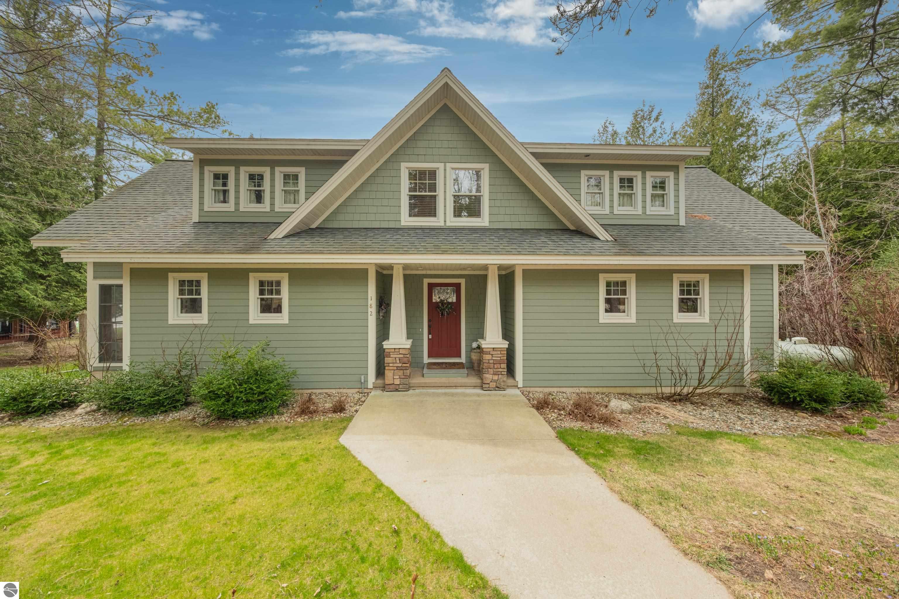 182 S Intermediate Lake Drive, Central Lake, MI 49622 — front exterior
