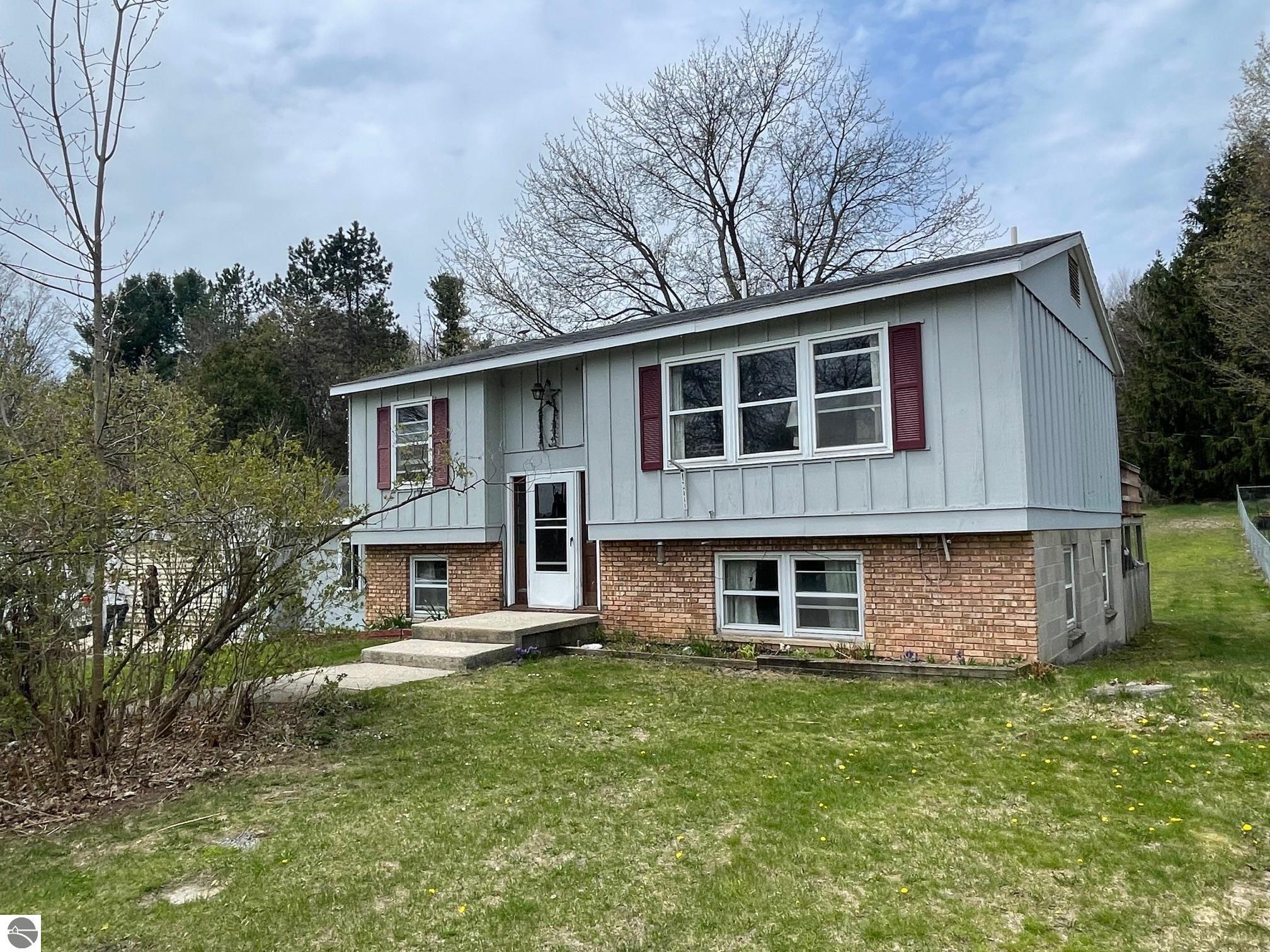 1993 West Street, Central Lake, MI 49622 — front exterior
