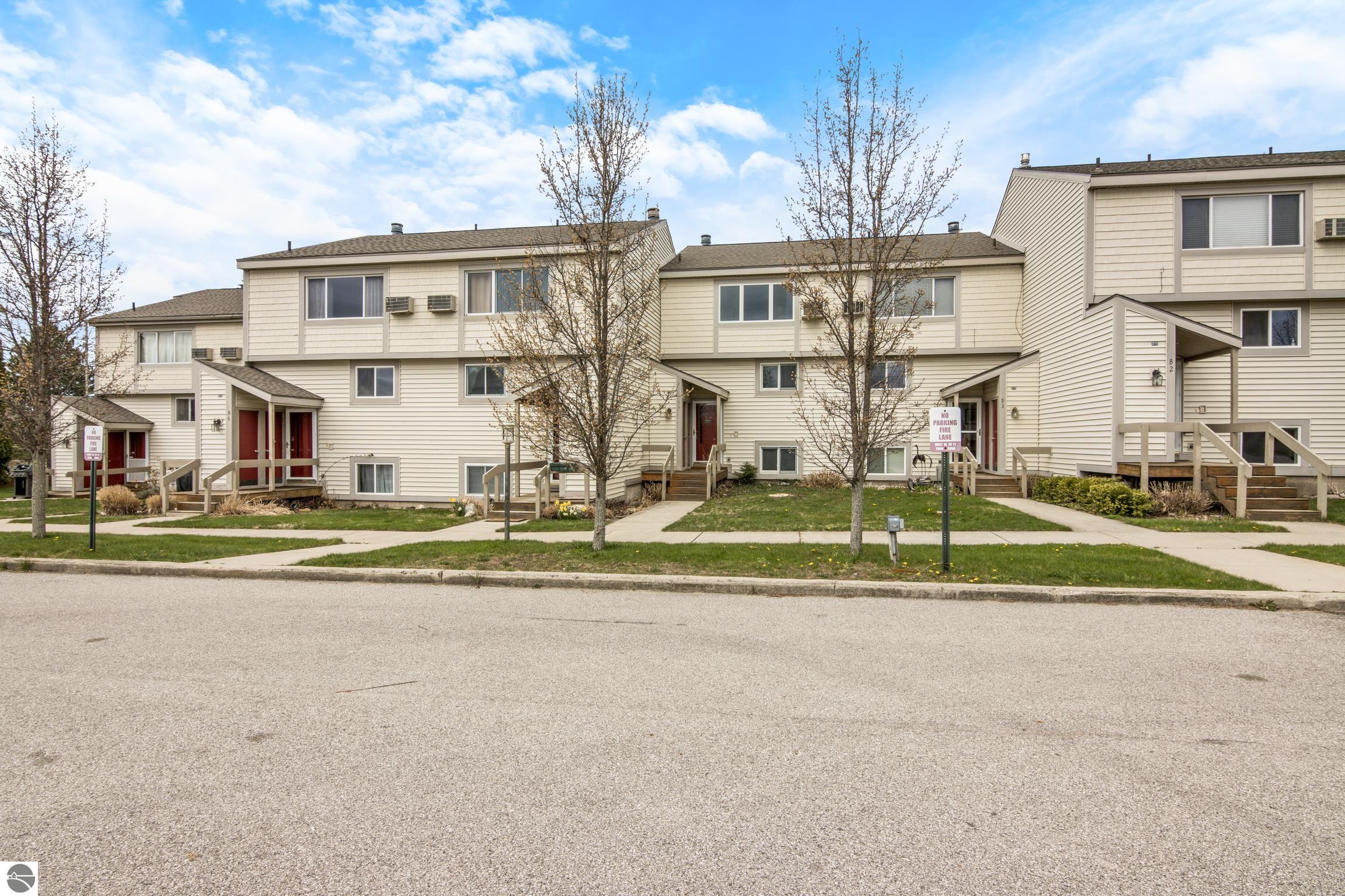 5000 S Townhouse Drive, Cedar, MI 49621 — front exterior