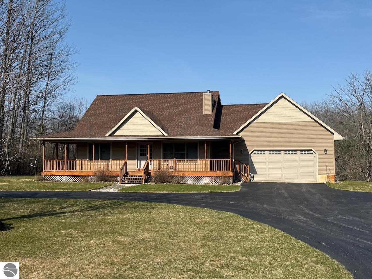 4921 White Road, Williamsburg, MI 49690 — front exterior