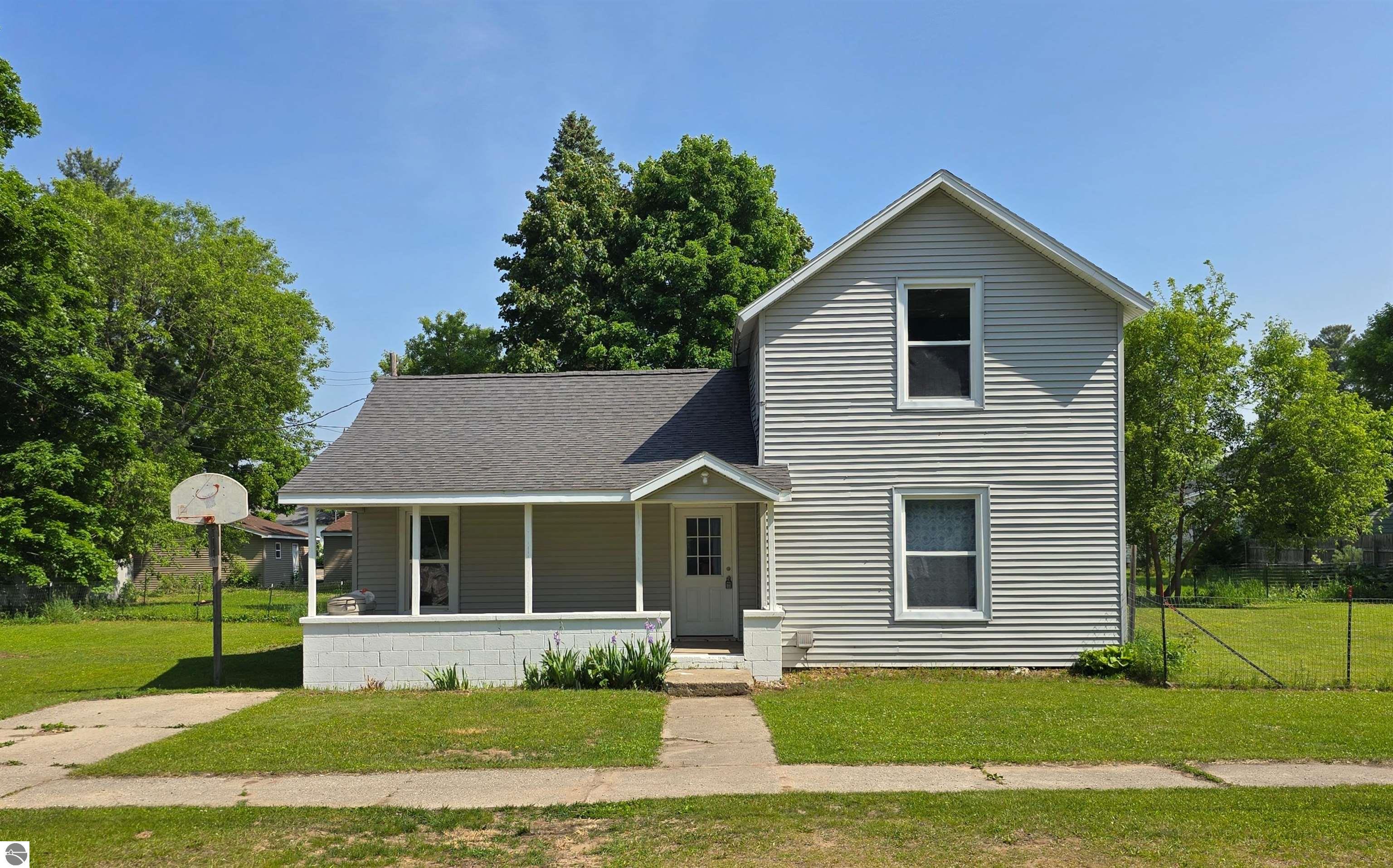 219 E Main, Mancelona, MI 49659 — front exterior