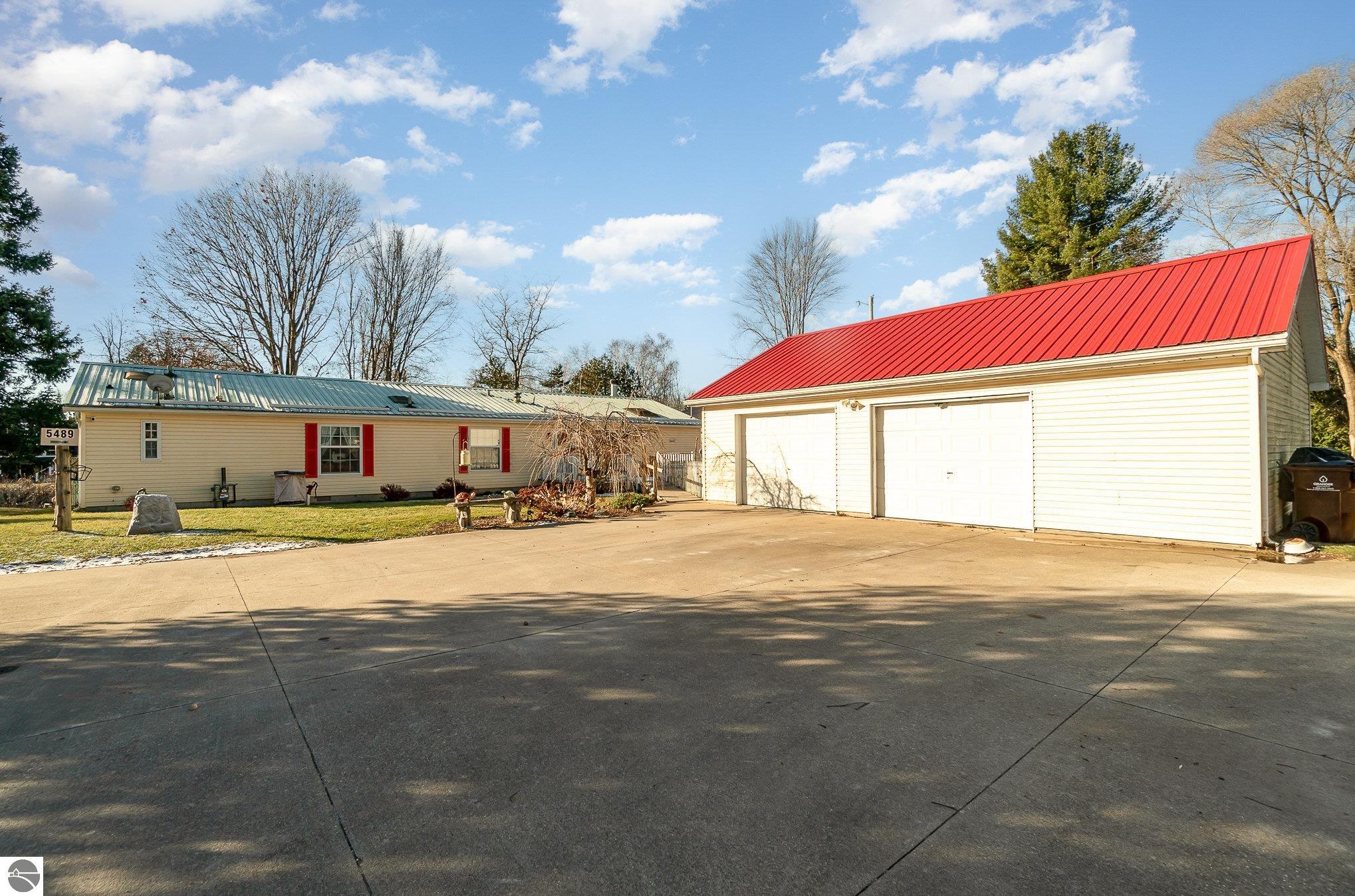 5489 W Lake Shore Drive, Weidman, MI 48893 — front exterior