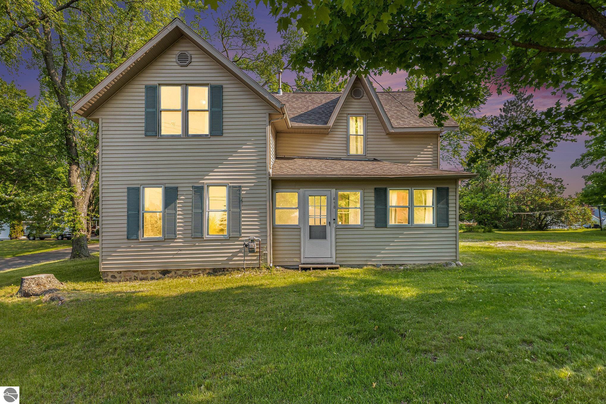 418 Grover Street, Marion, MI 49665 — front exterior