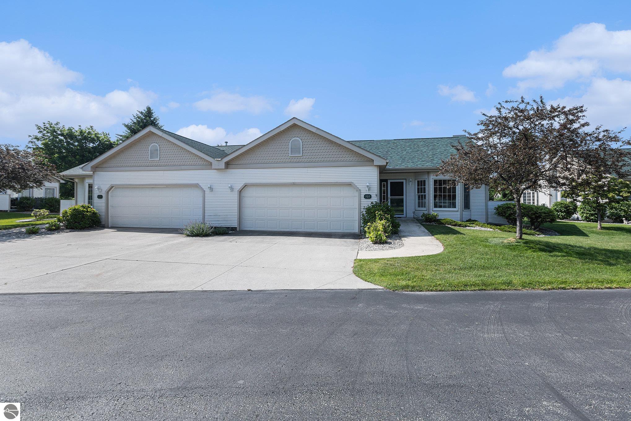 301 Golf View Lane, Elk Rapids, MI 49629 — front exterior