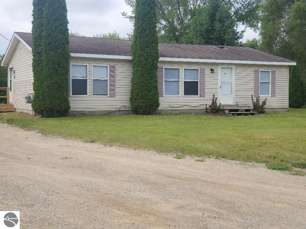 5819 Indian Lane, Weidman, MI 48893 — front exterior