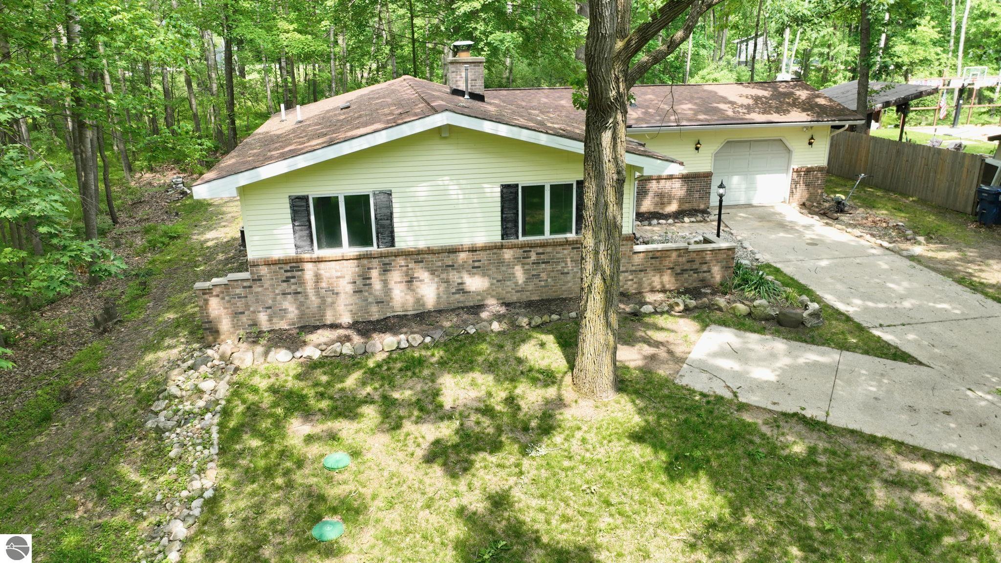 1207 Queensway Drive, Lake Isabella, MI 48893 — front exterior