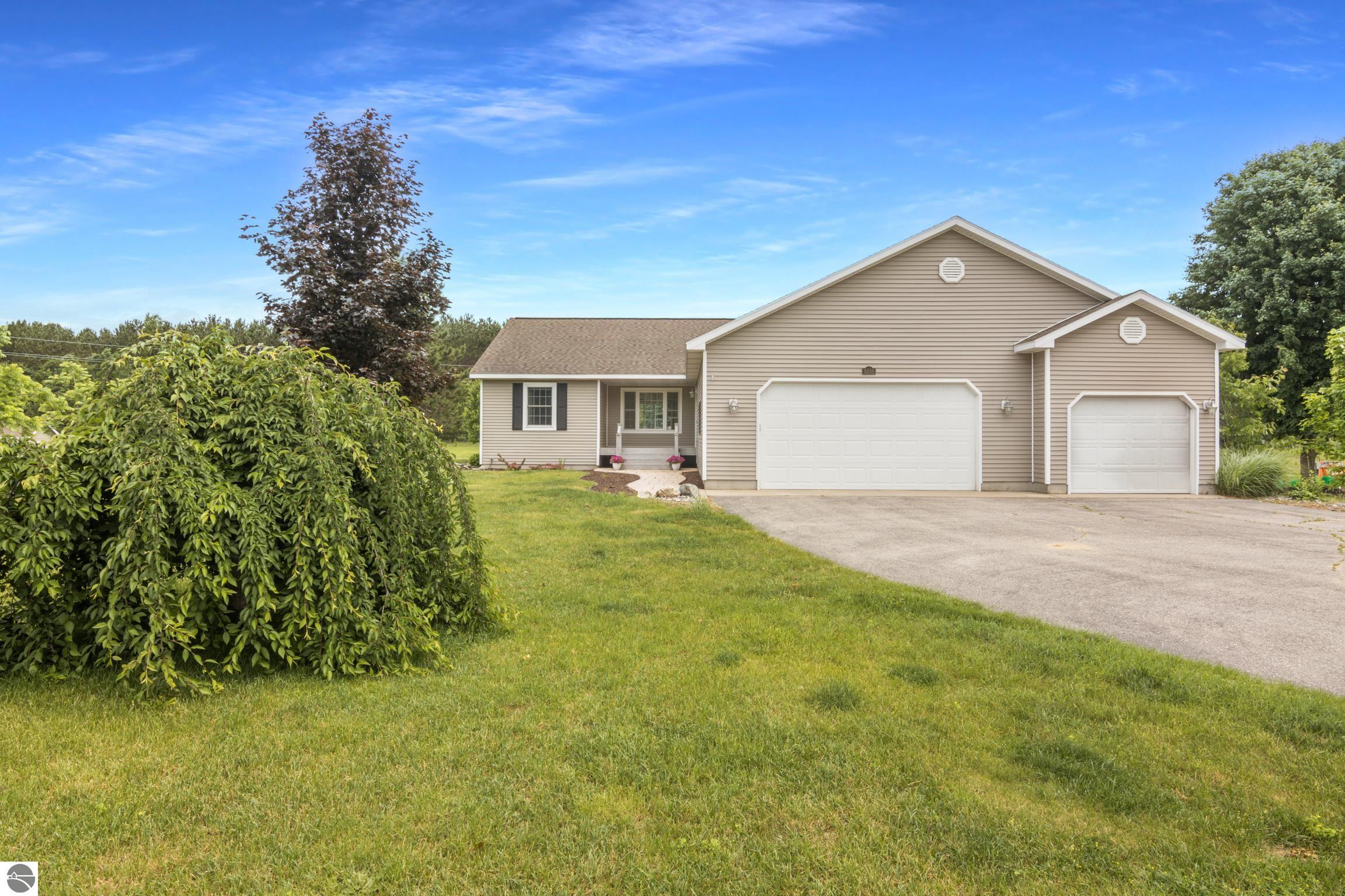 6886 Windwood Drive, Lake Ann, MI 49650 — front exterior