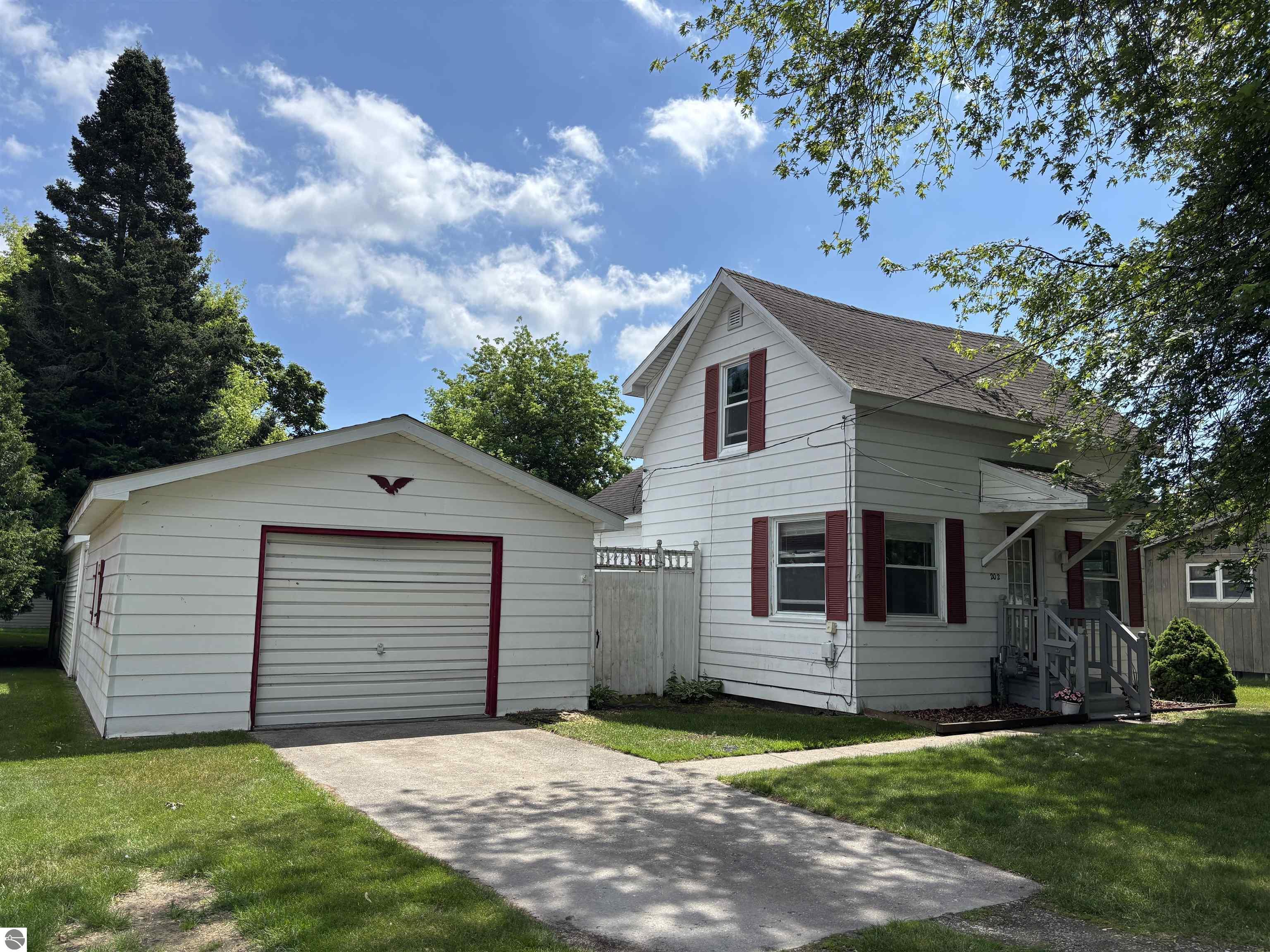 202 Evans Street, East Tawas, MI 48730 — front exterior