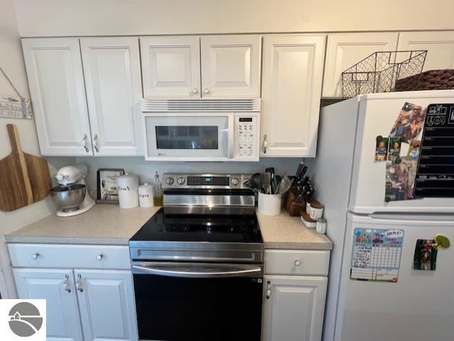 129 Grant Street, East Tawas, MI 48730 — Photo 19