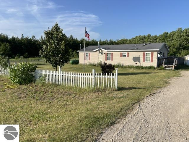9875 Country Pines Drive, Kingsley, MI 49649 — front exterior